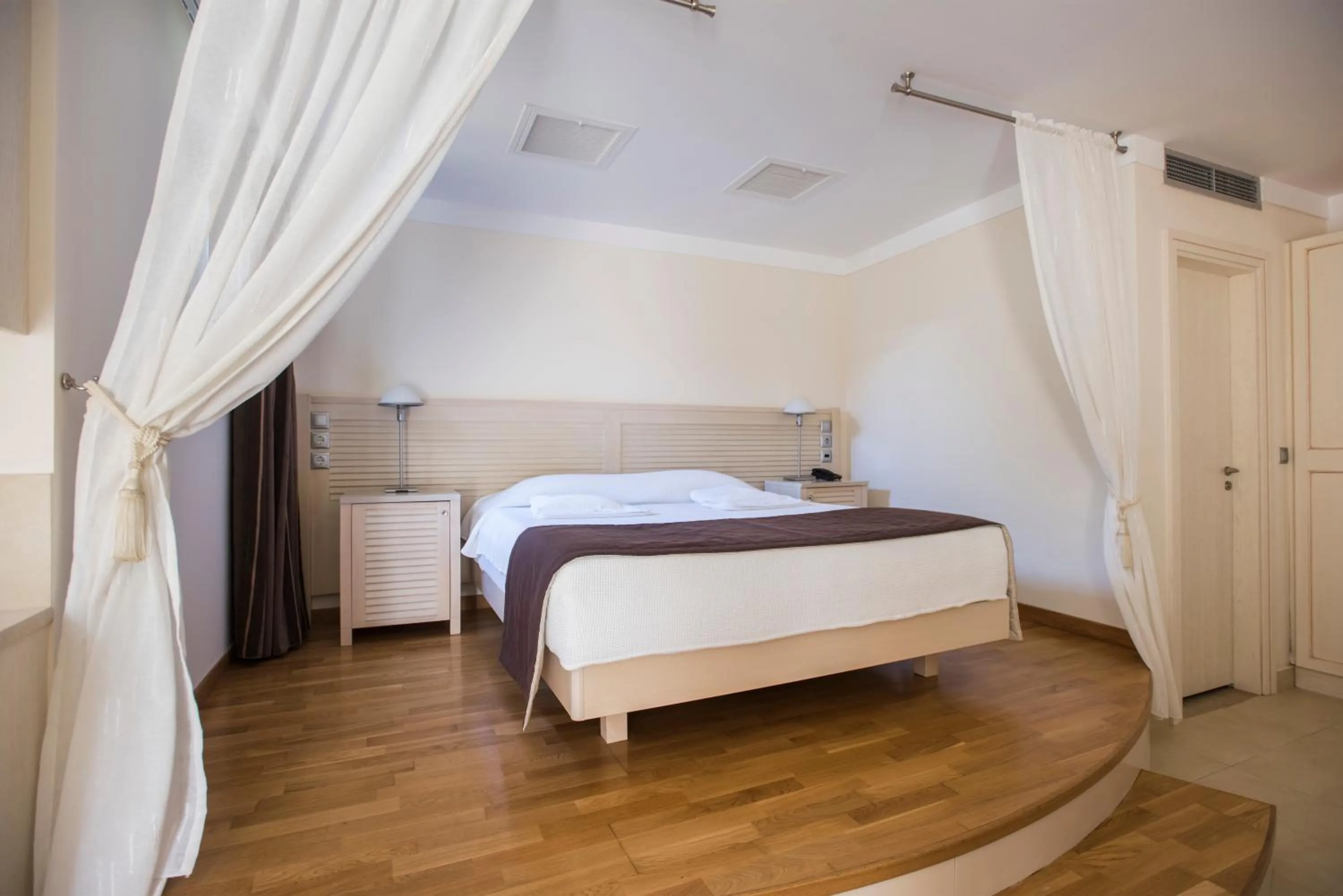 Bed in Almiriki Chios Rooms & Apartments