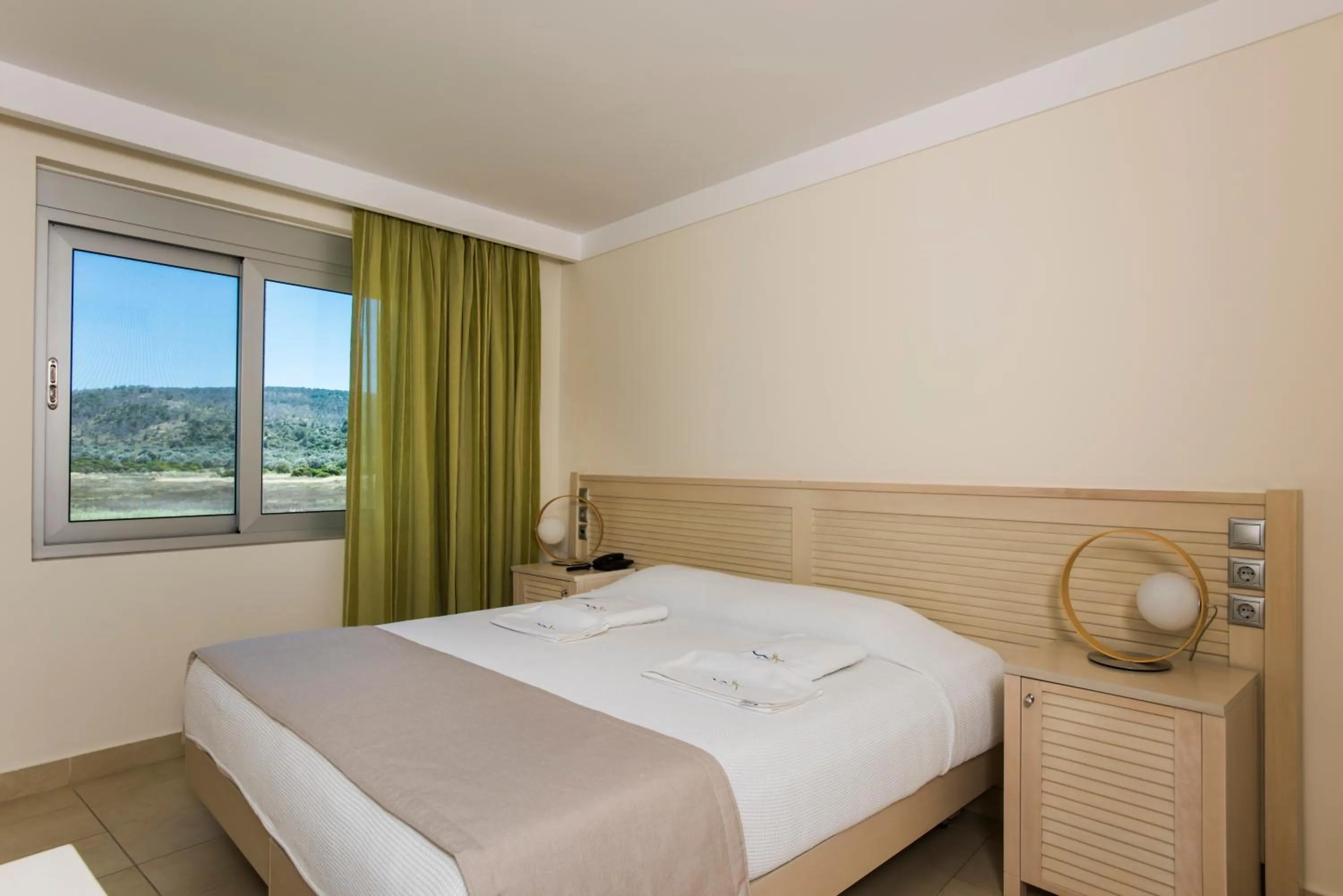 Bed in Almiriki Chios Rooms & Apartments