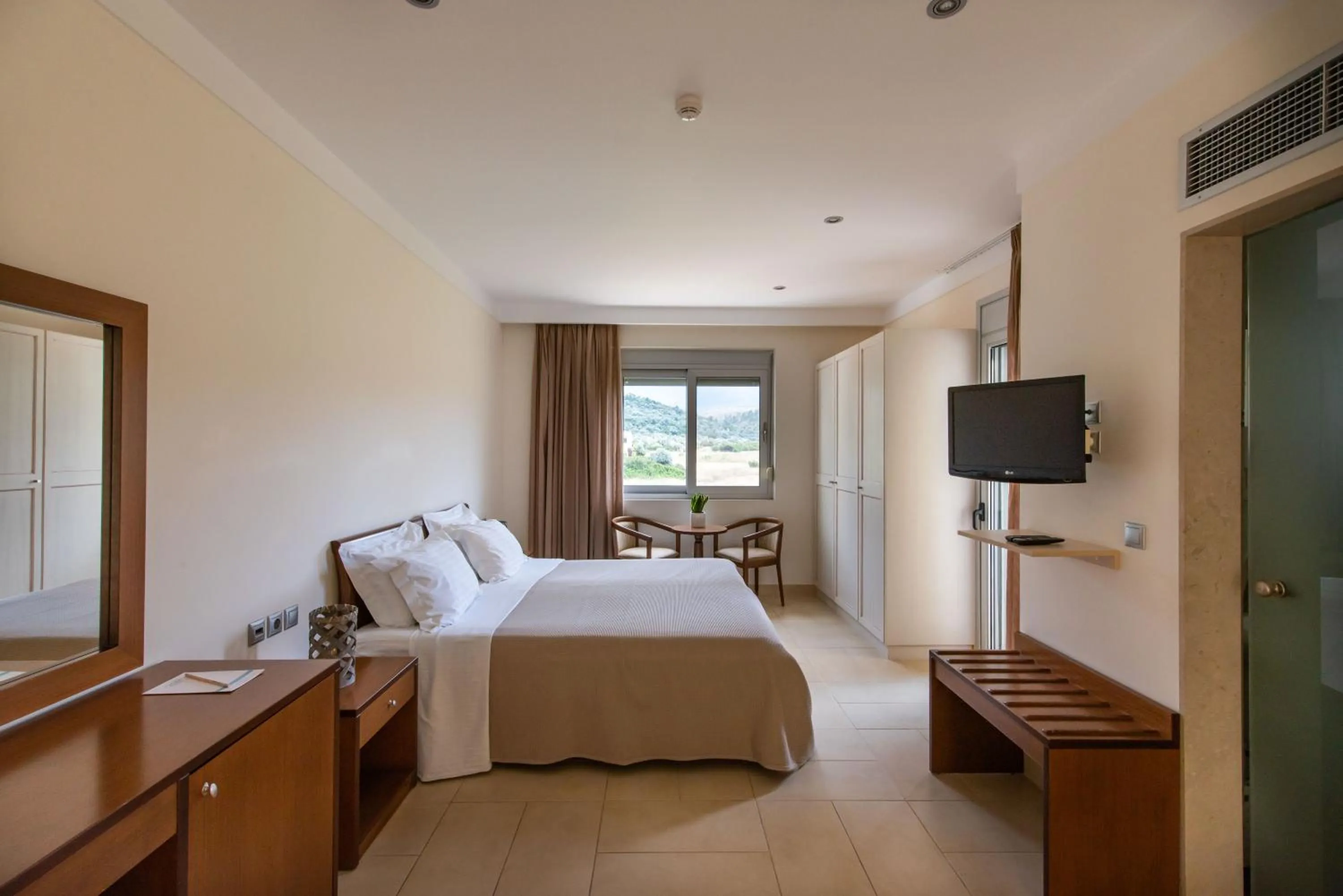 Bed in Almiriki Chios Rooms & Apartments