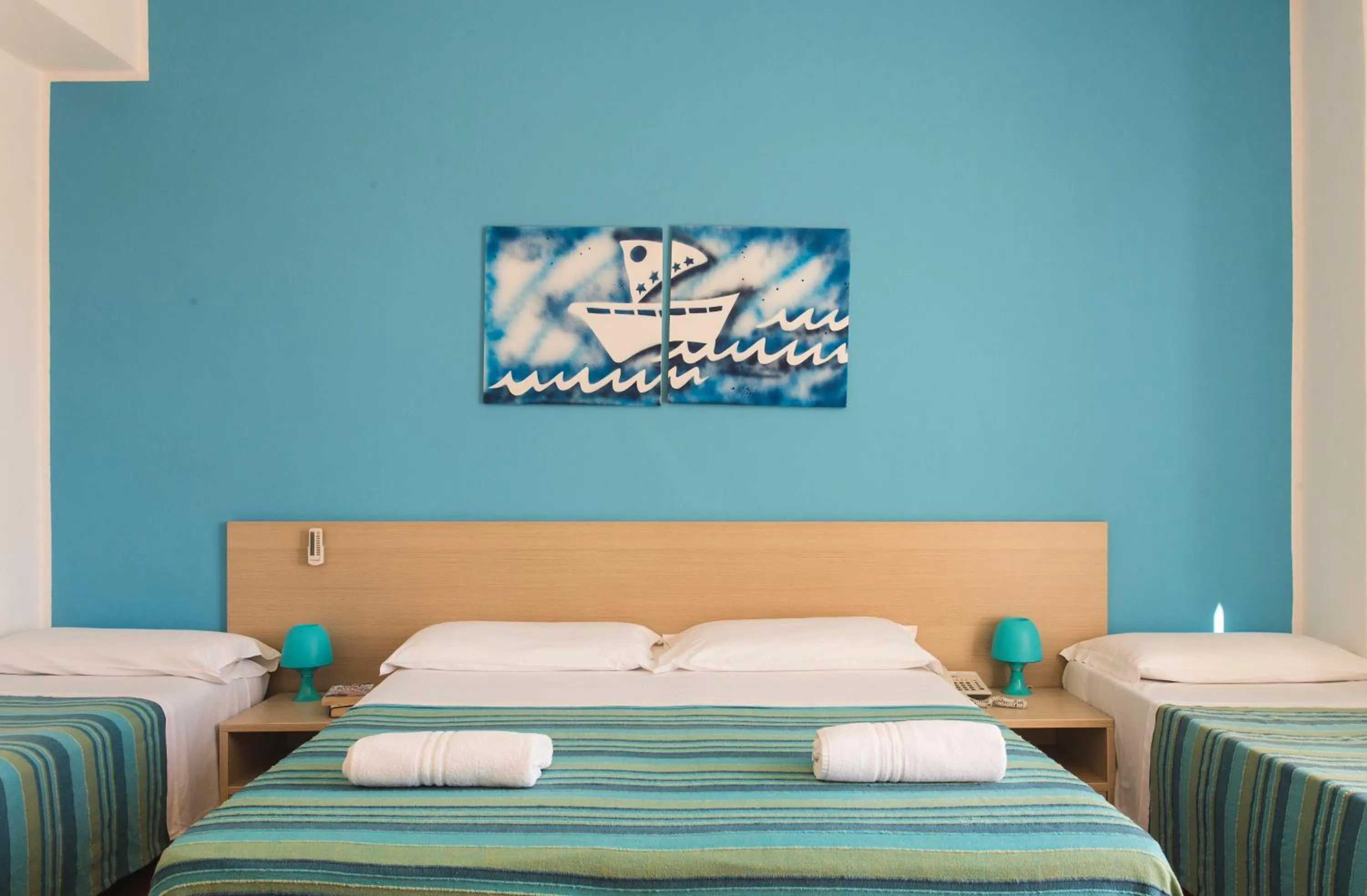Bed in Hotel Baia Del Sole