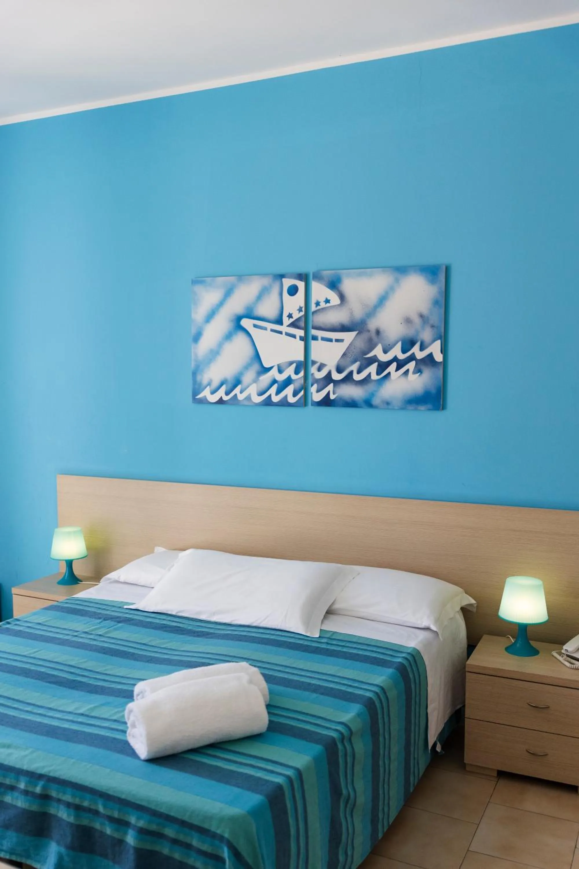 Bed in Hotel Baia Del Sole