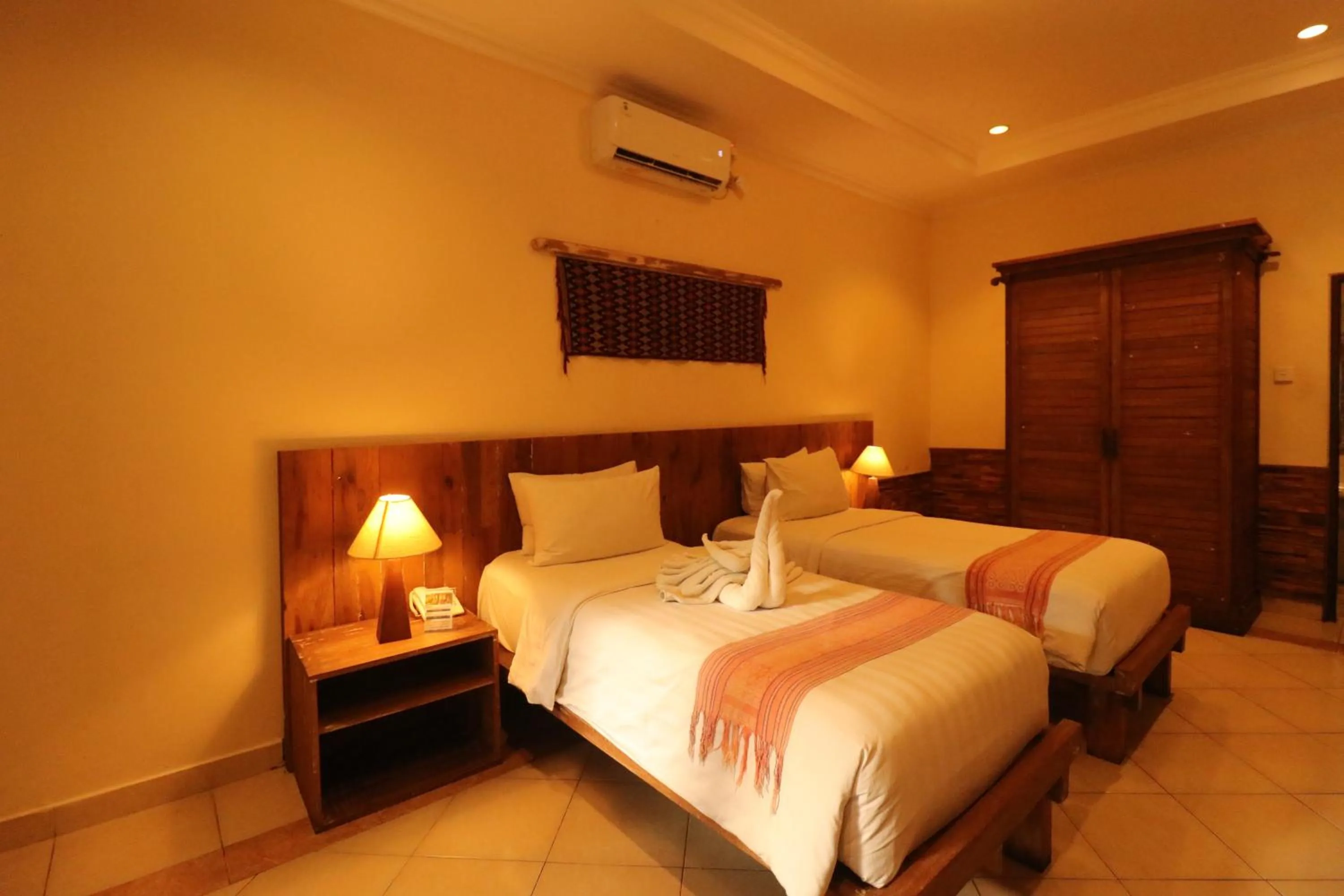 Bed in Mina Pelasa Hotel