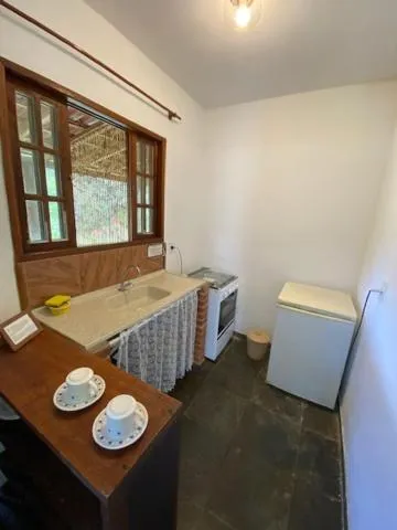 Kitchen or kitchenette in Aconchegos Ile de France