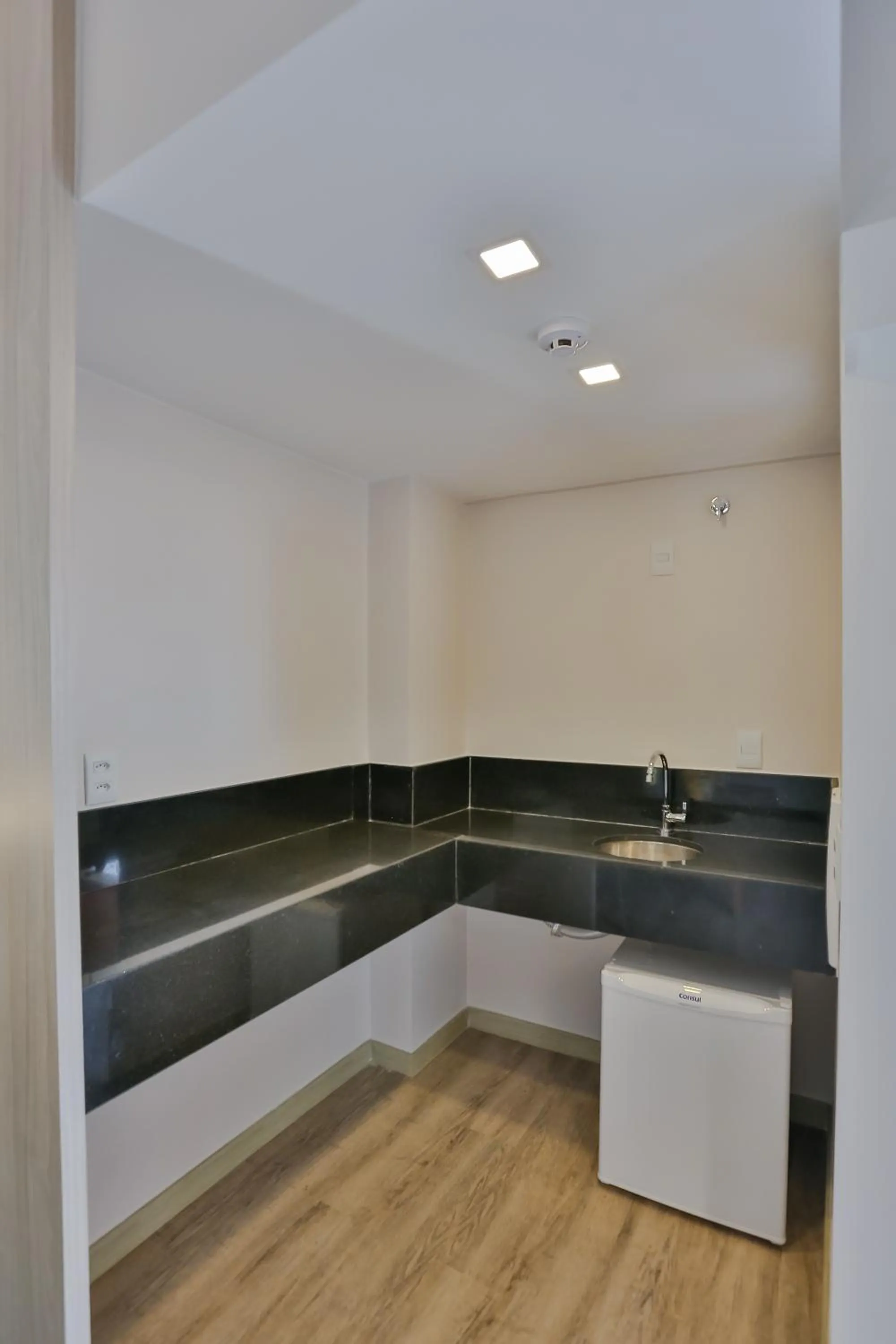 Kitchen or kitchenette in San Marino Hotel