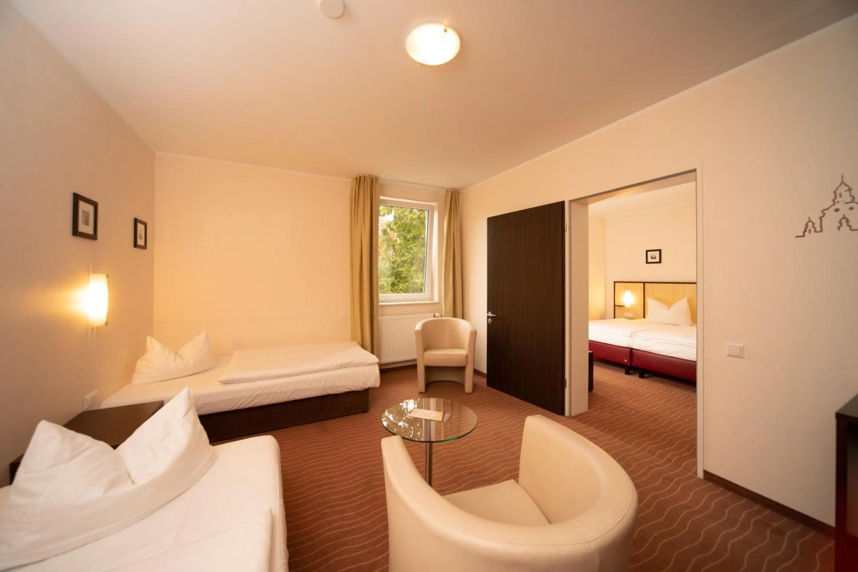 Living room, Bed in Bergwirtschaft Wilder Mann Hotel und Restaurant