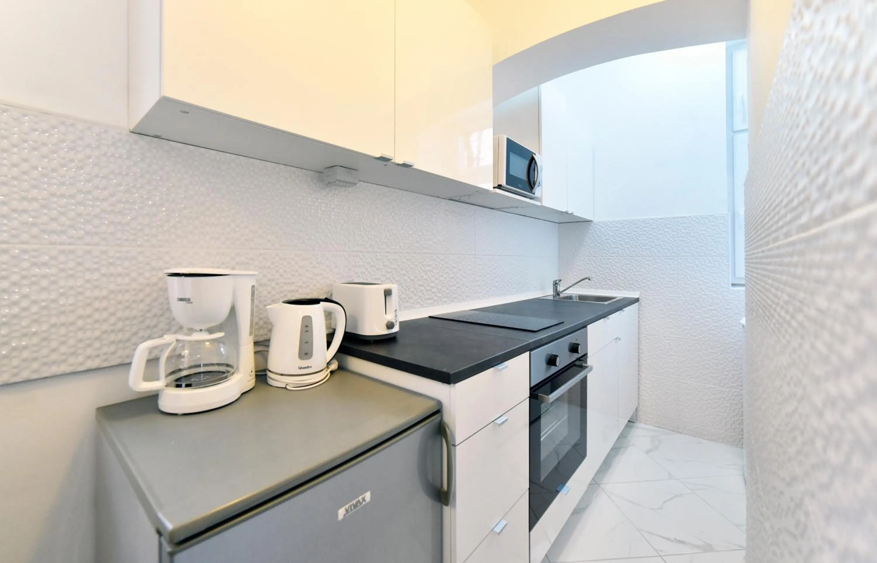 Kitchen or kitchenette in Apartment Sermazi