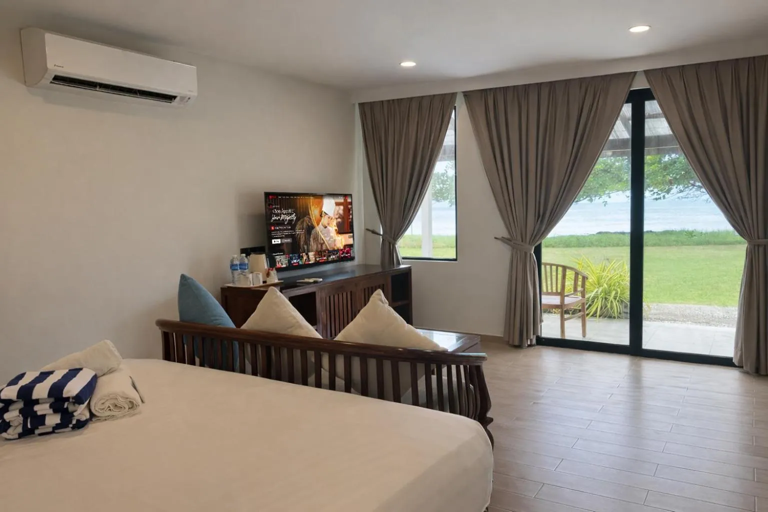 Bed in Frangipani Langkawi Resort