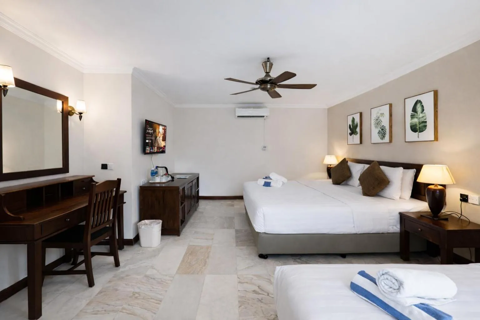 Bed in Frangipani Langkawi Resort