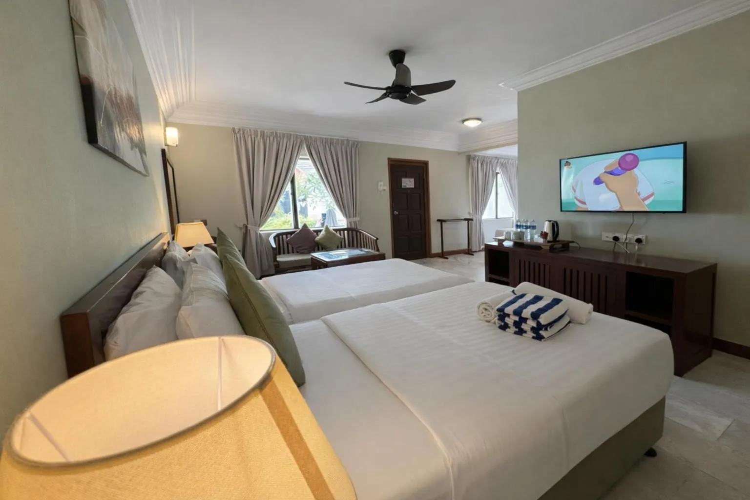 Communal lounge/ TV room, Bed in Frangipani Langkawi Resort