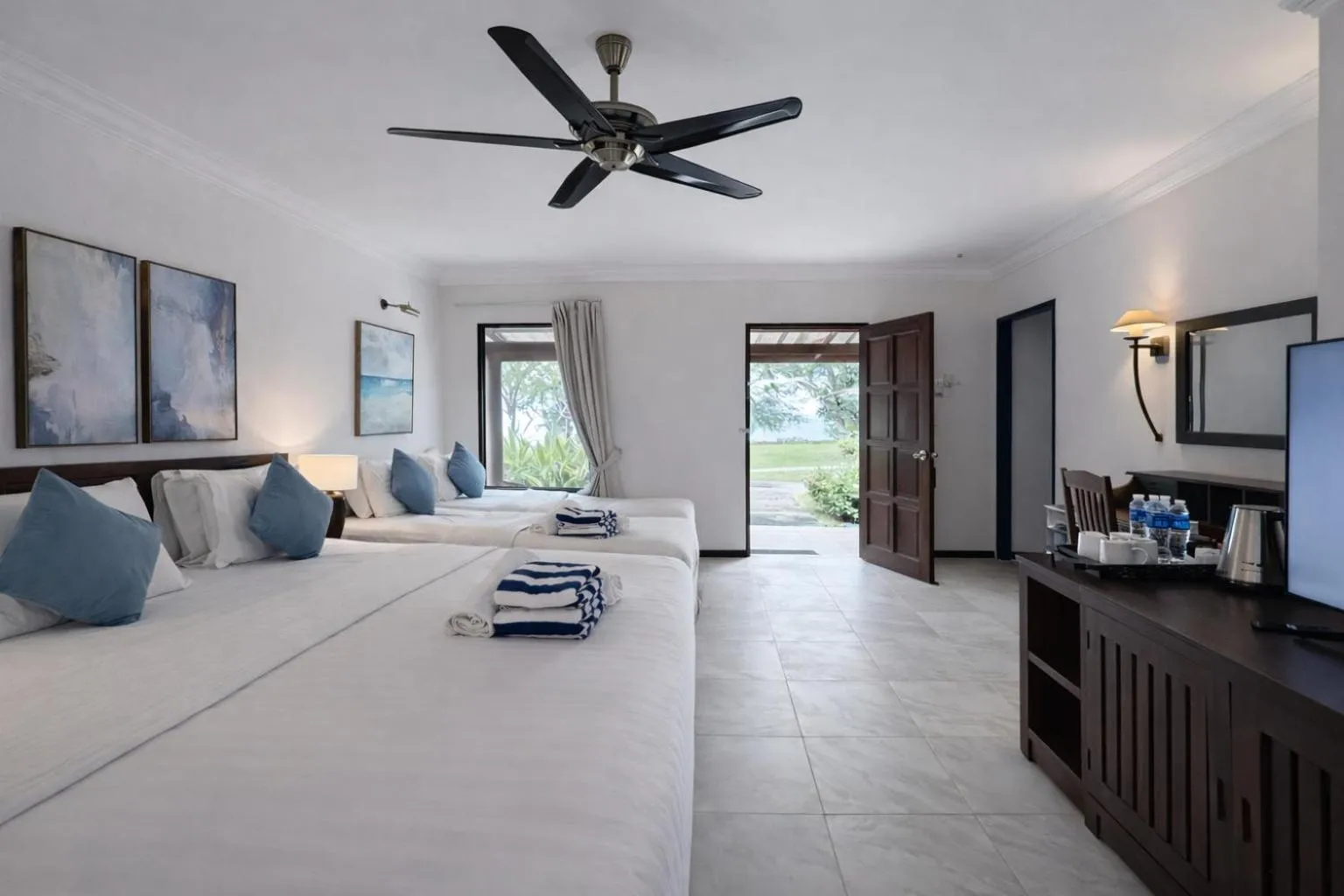 Bed in Frangipani Langkawi Resort