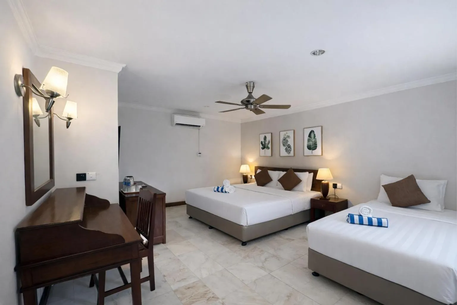 Bed in Frangipani Langkawi Resort