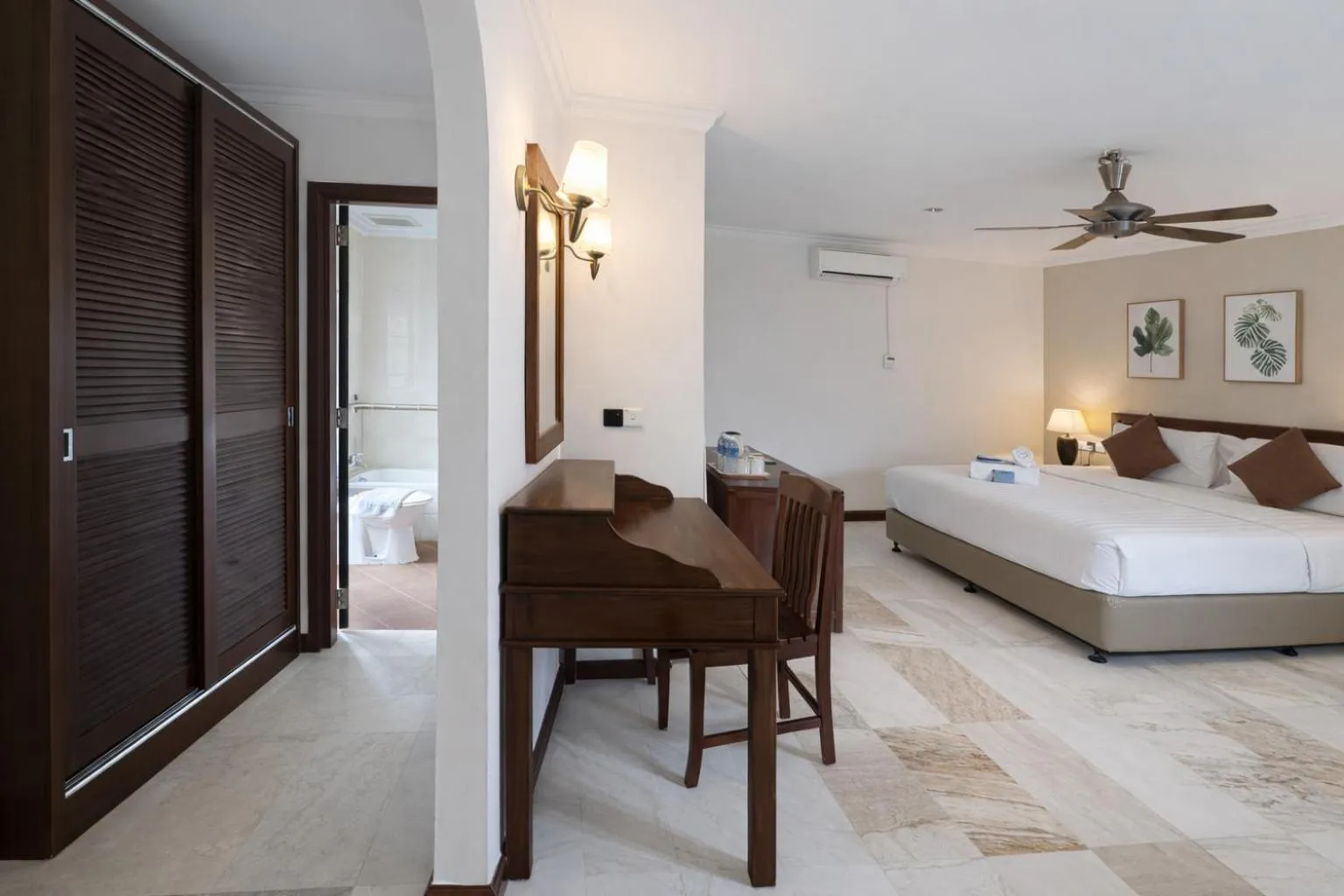 Bed in Frangipani Langkawi Resort