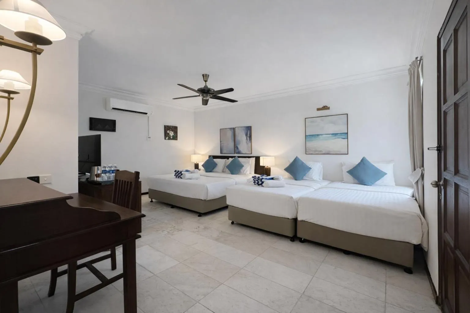 Bed in Frangipani Langkawi Resort