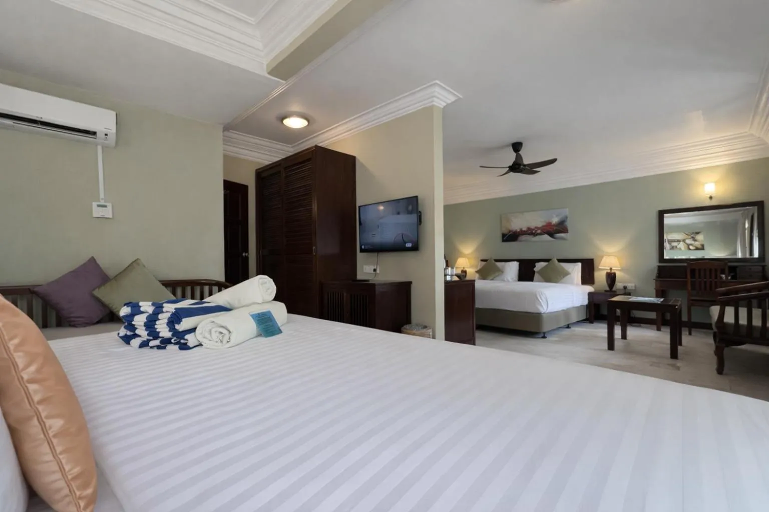 Bed in Frangipani Langkawi Resort