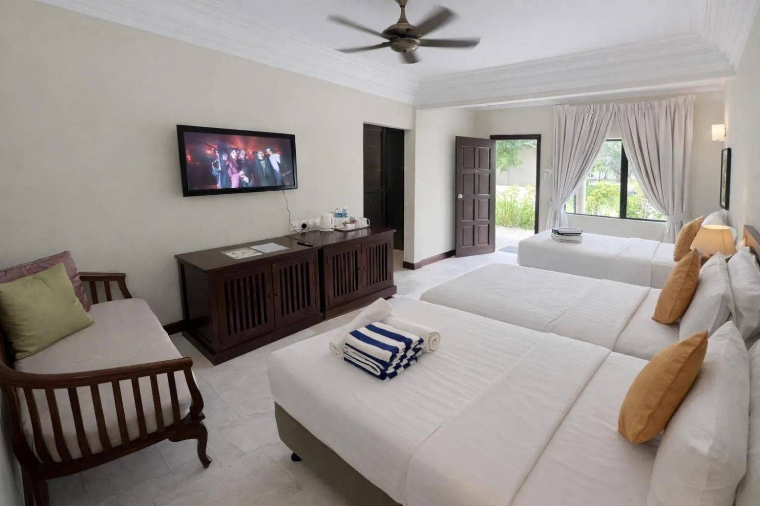 Bed in Frangipani Langkawi Resort