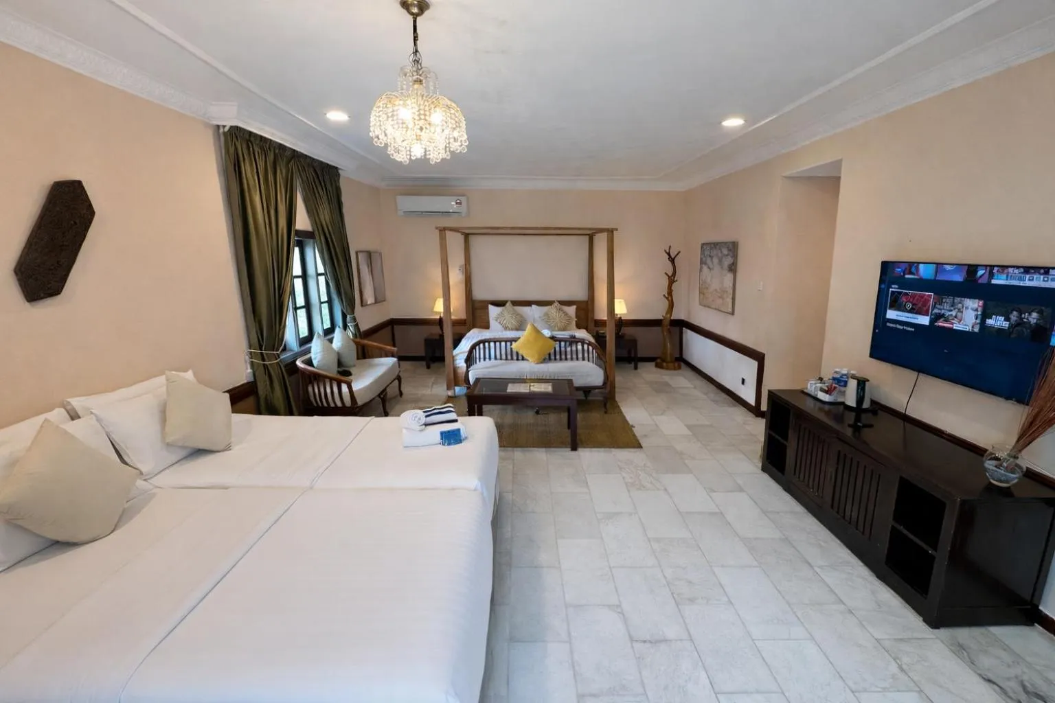 Bed in Frangipani Langkawi Resort