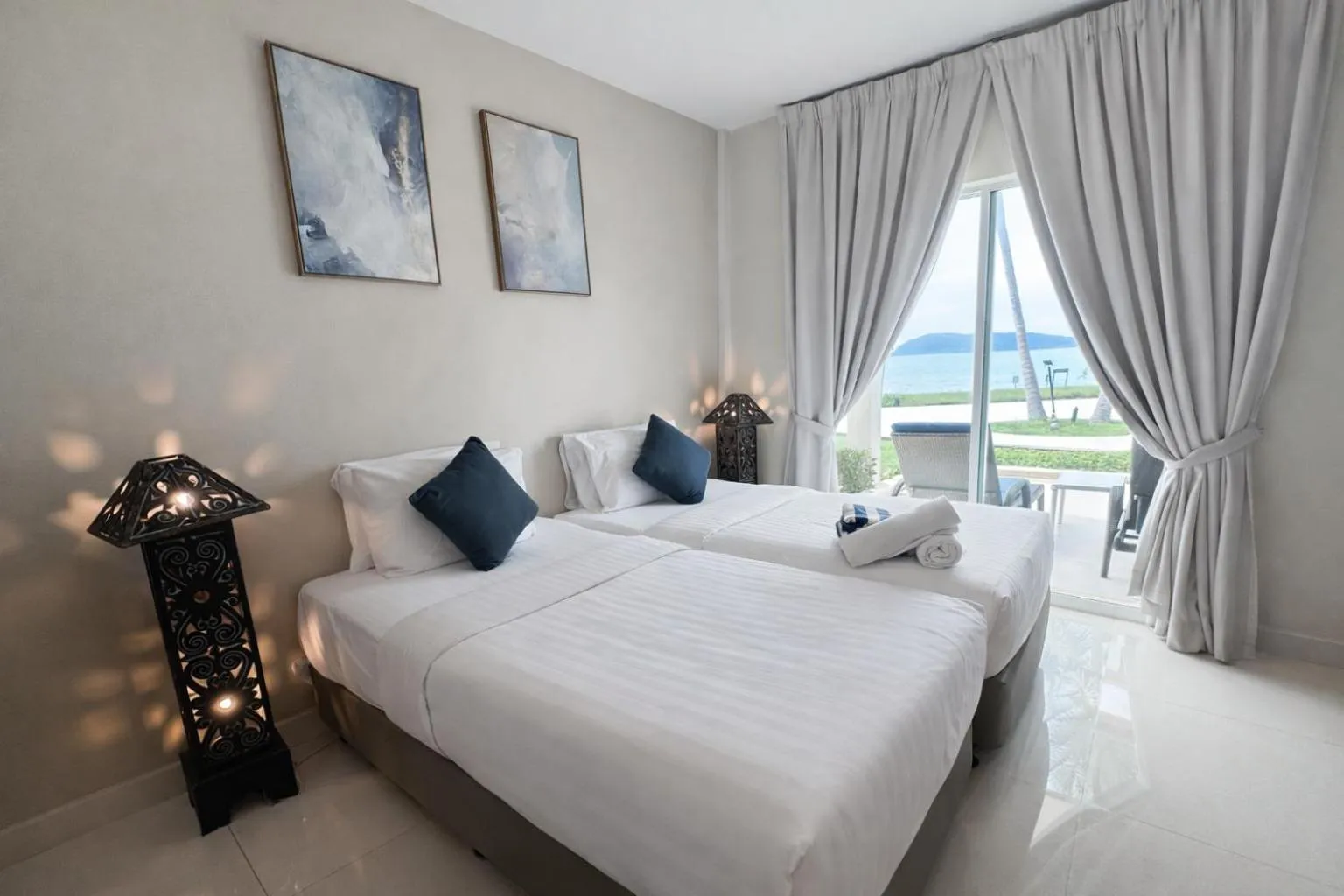 Bed in Frangipani Langkawi Resort