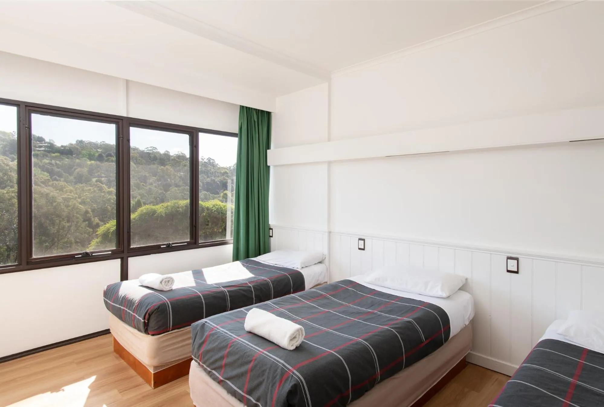 Bed in Village Family Motor Inn