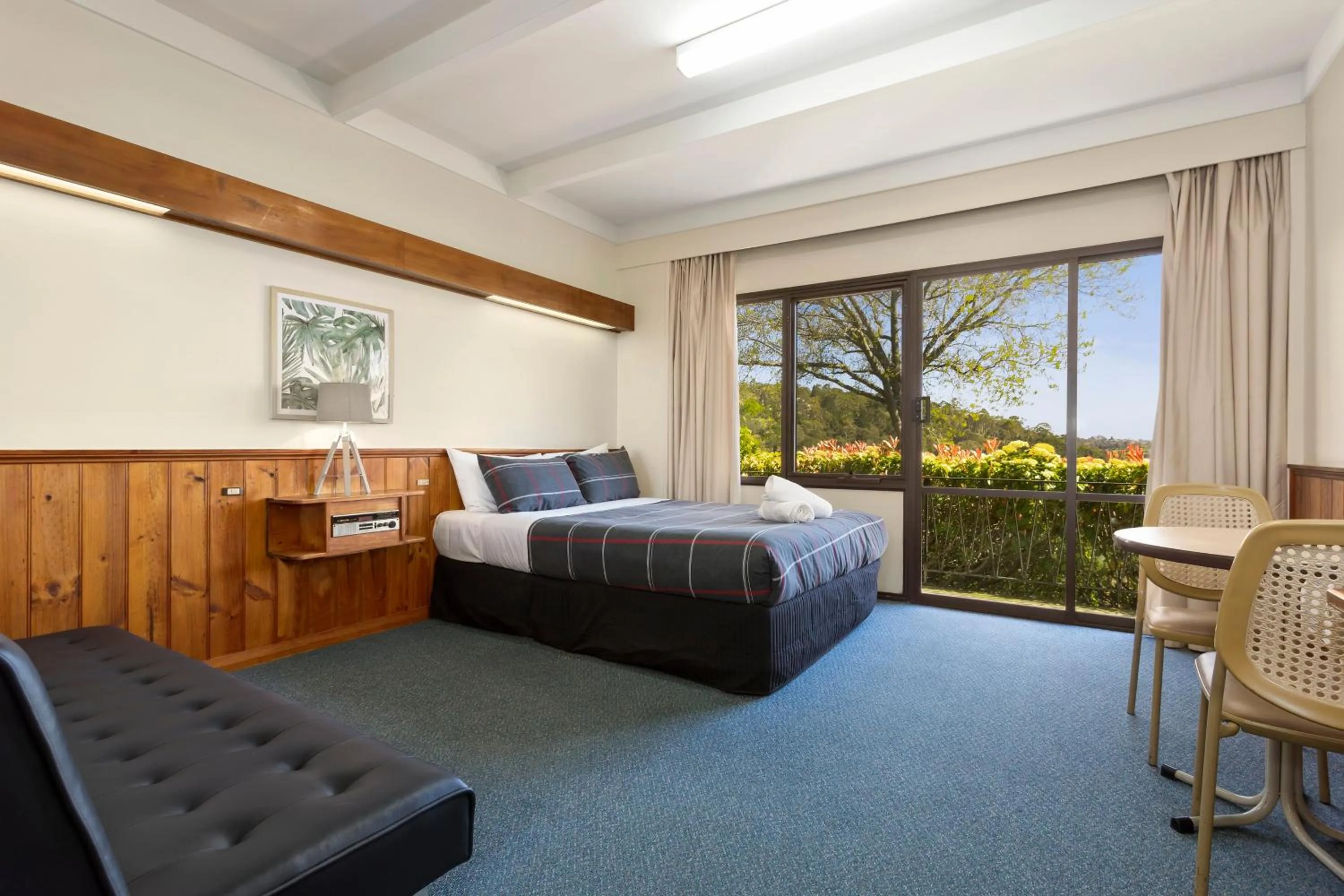 Bed in Village Family Motor Inn