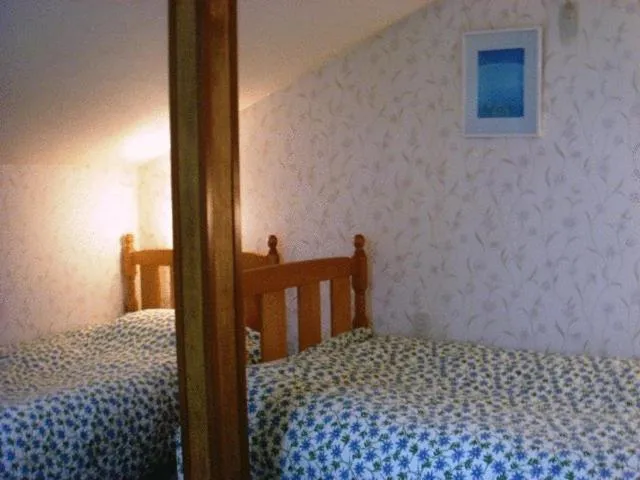 Bedroom, Bed in Pension Fryingpan