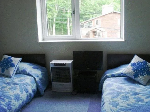 Bedroom, Bed in Pension Fryingpan