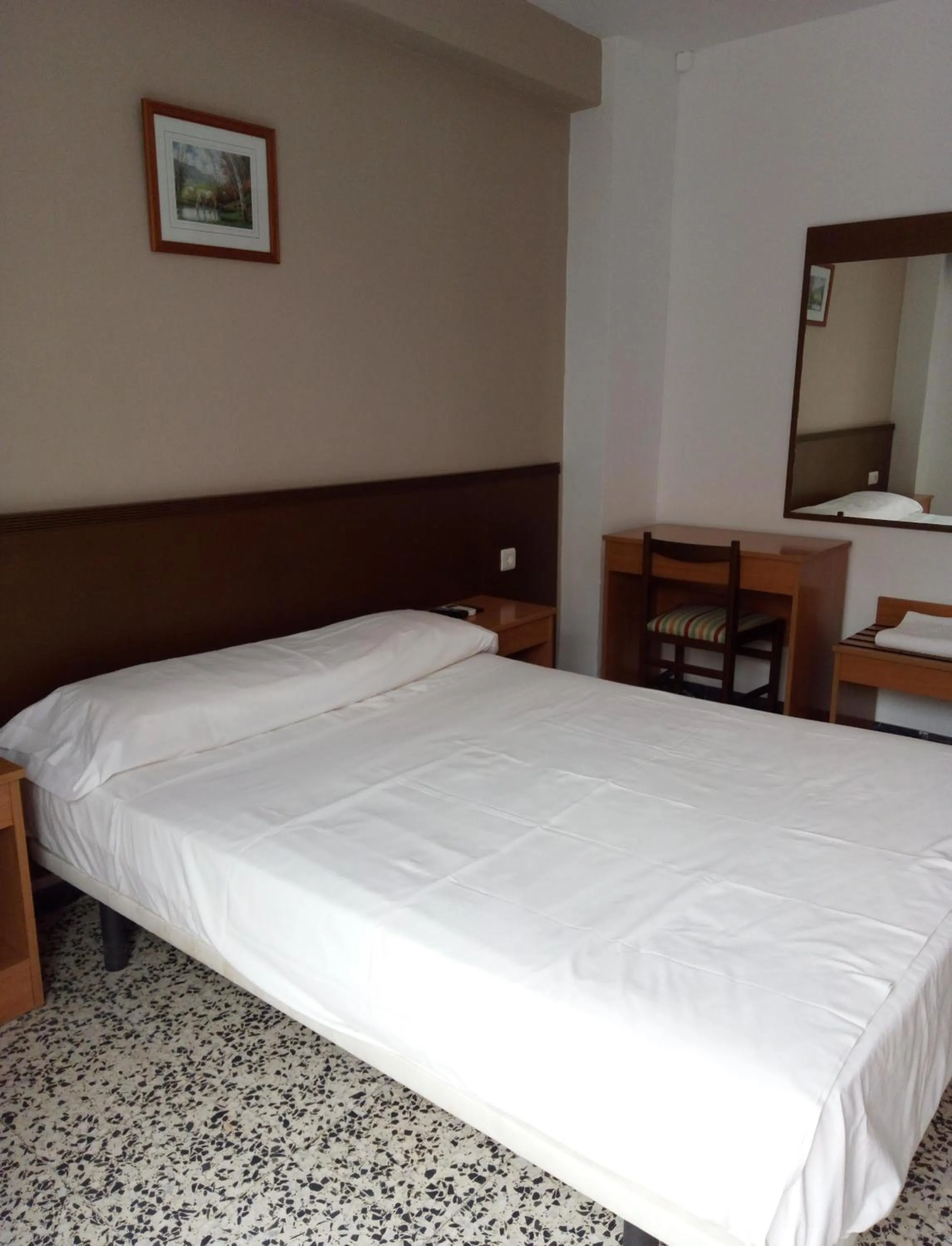 Bed in Hotel Iris