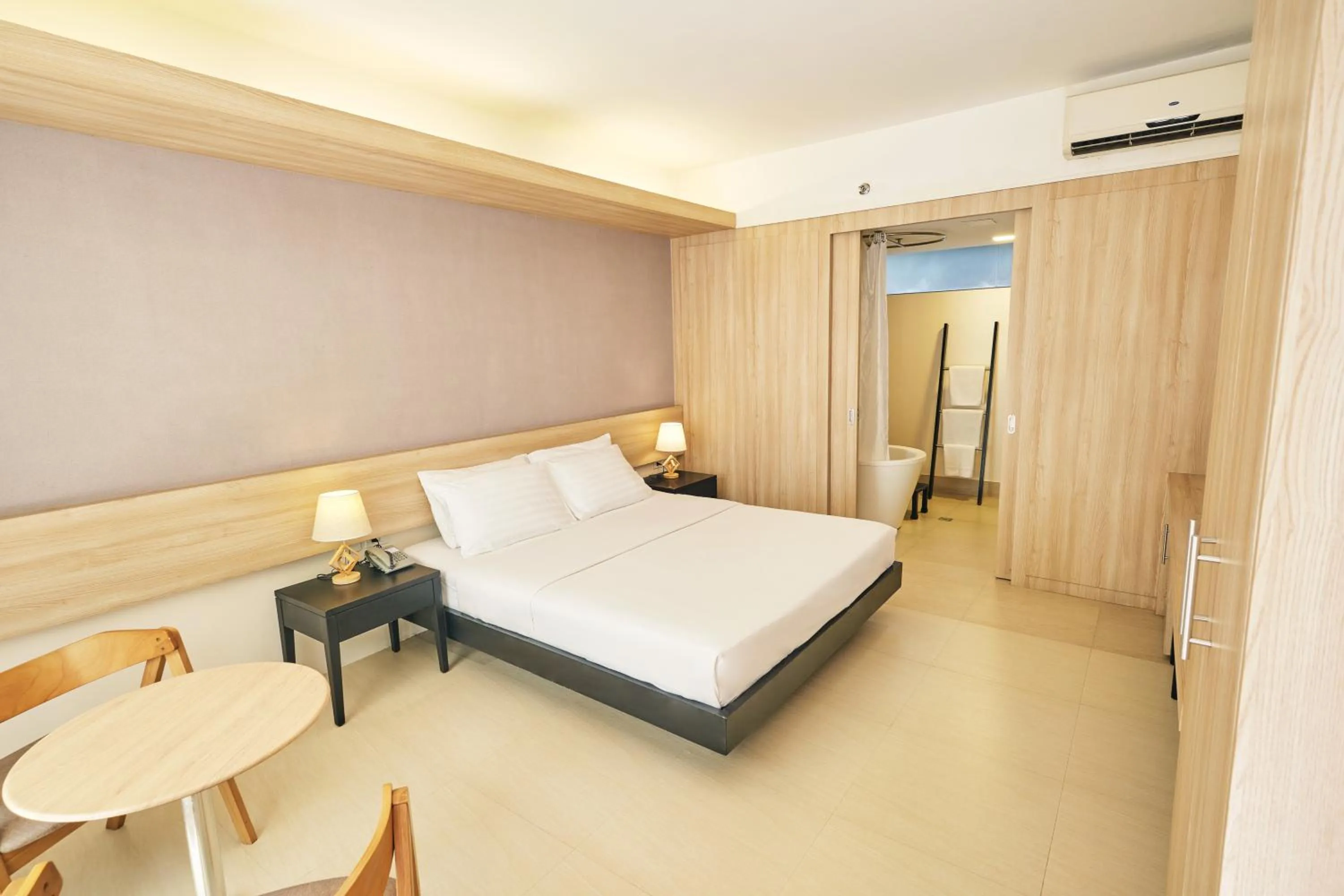 Photo of the whole room, Bed in The Tides Hotel Boracay