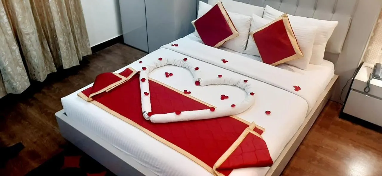 Bed in Hotel Blue Pearl Chikmagalur