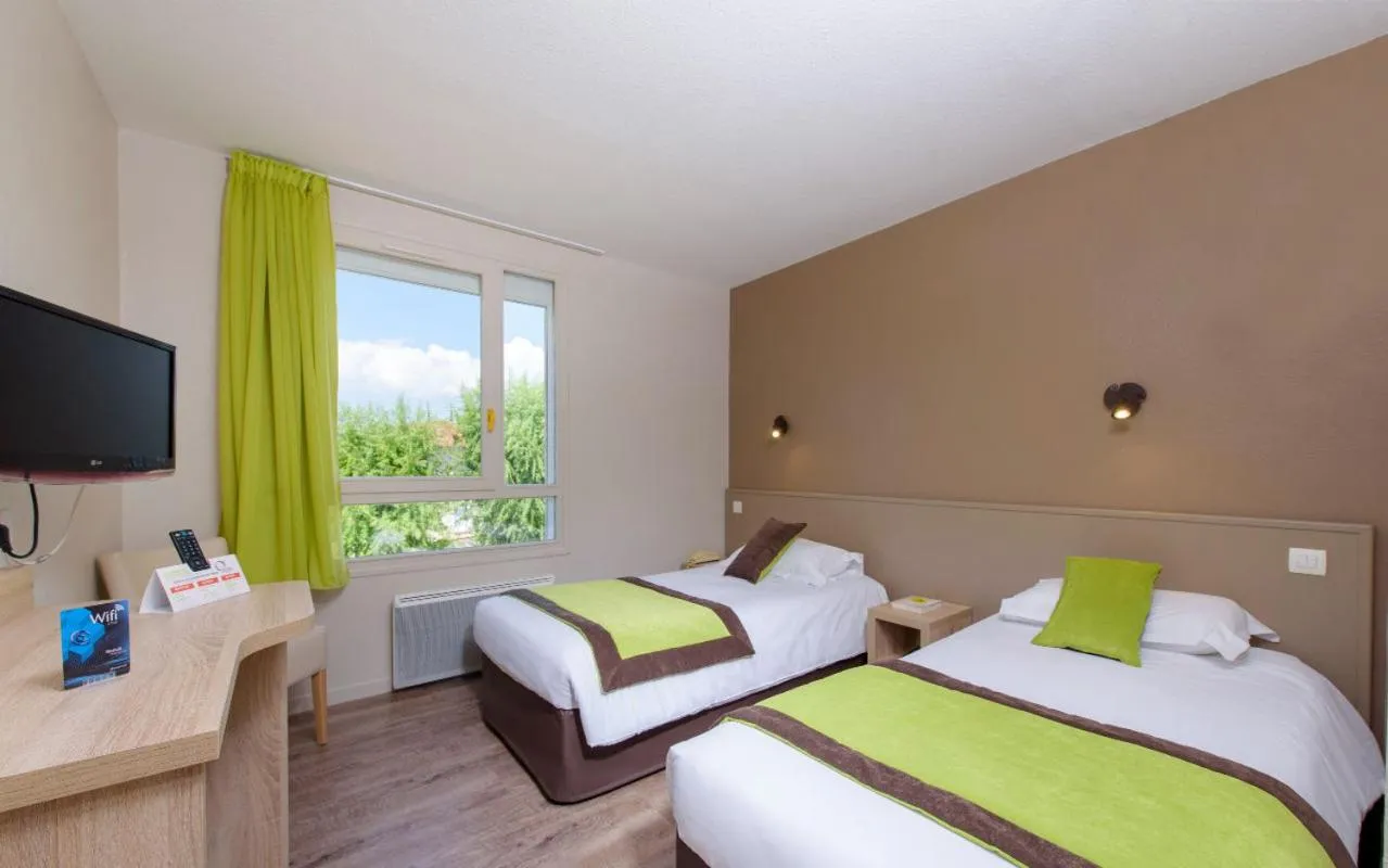 Bed in Hotel Le Chatard