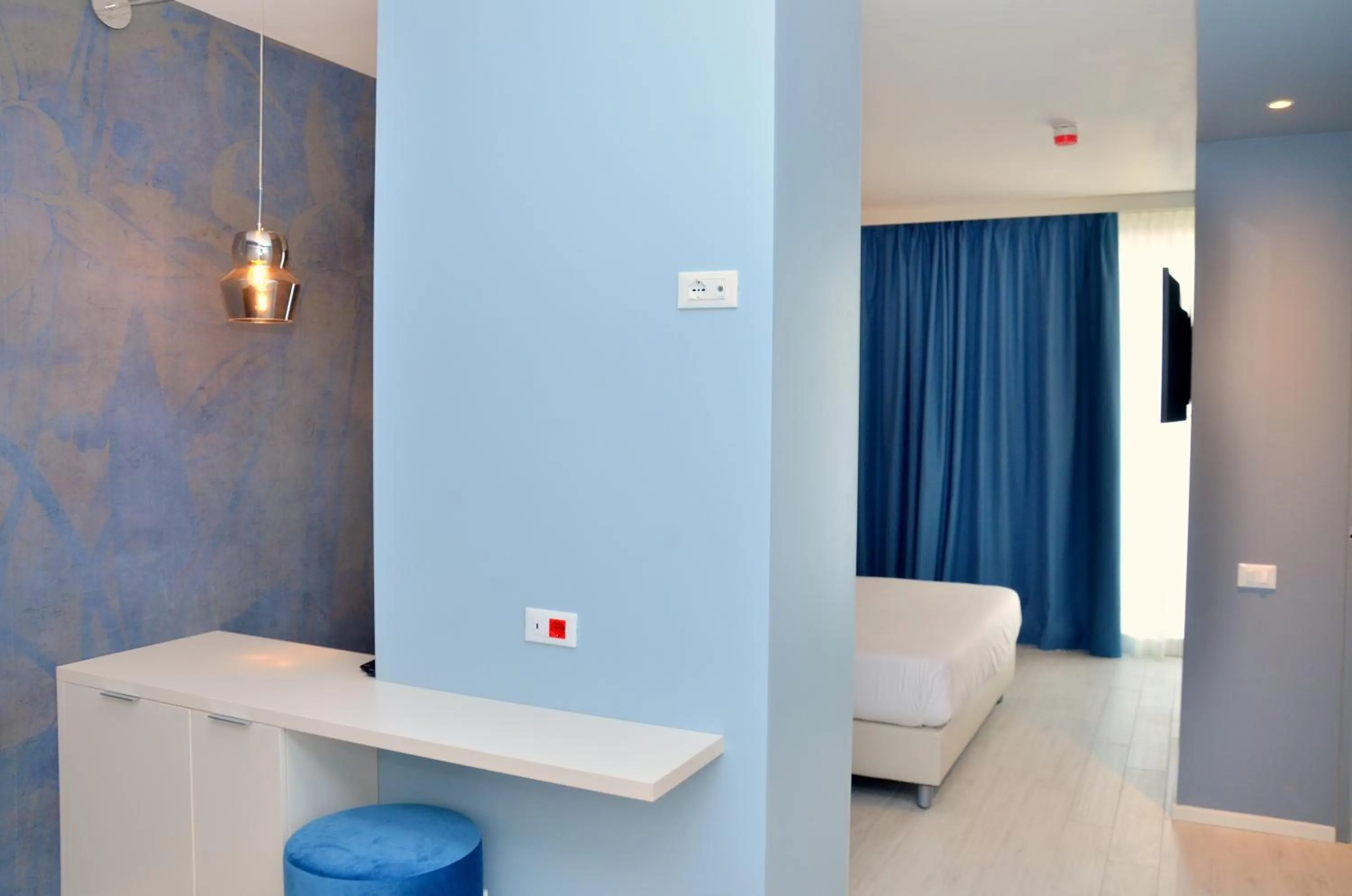 Seating area, Bed in Hotel Amburgo