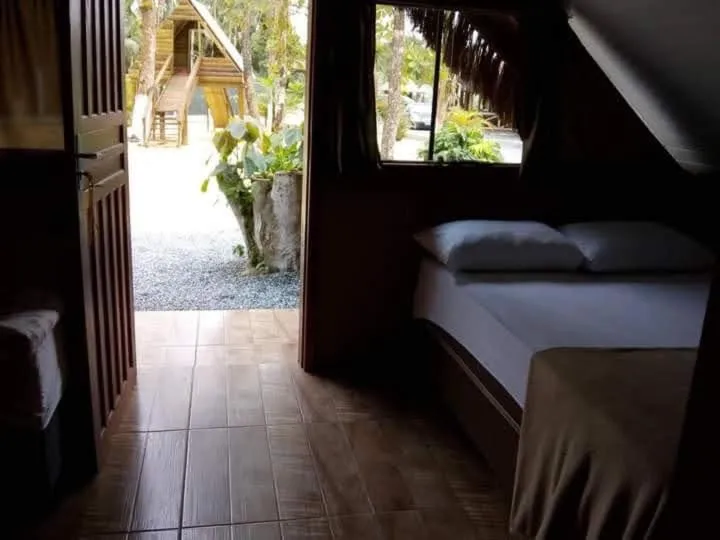 Bed in Pousada Rancho do Nhesko