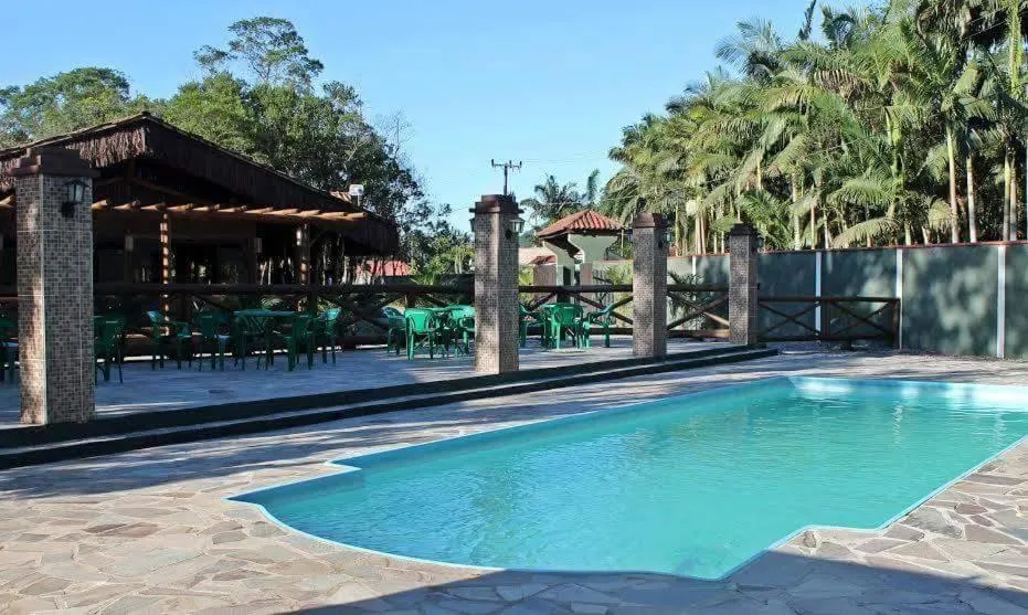 Swimming pool in Pousada Rancho do Nhesko