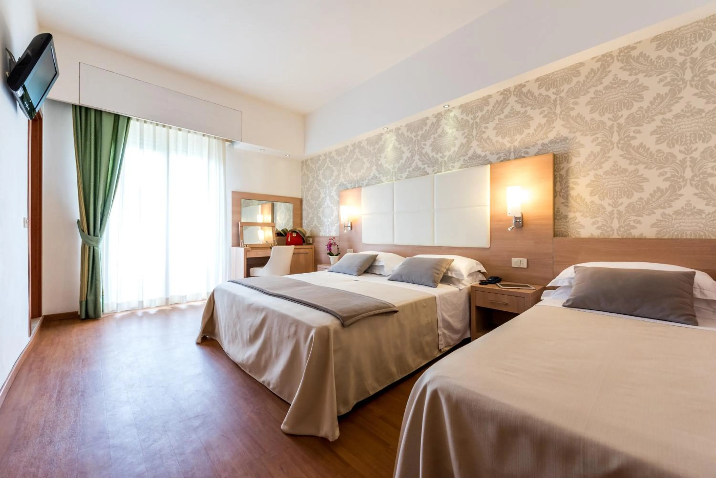 Photo of the whole room, Bed in Michelangelo Cesenatico
