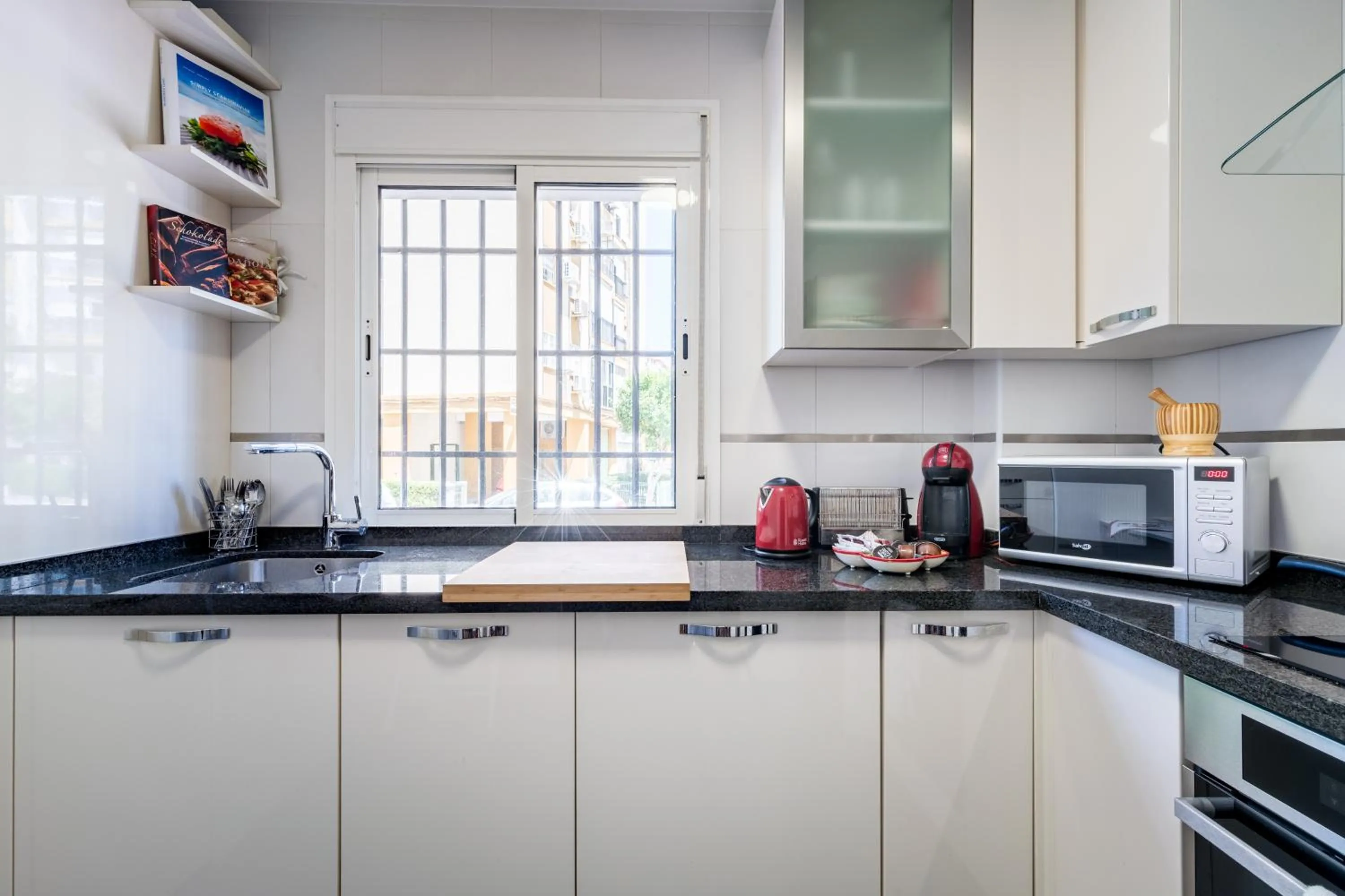 Communal kitchen in Anna Triana Boutique Apartament