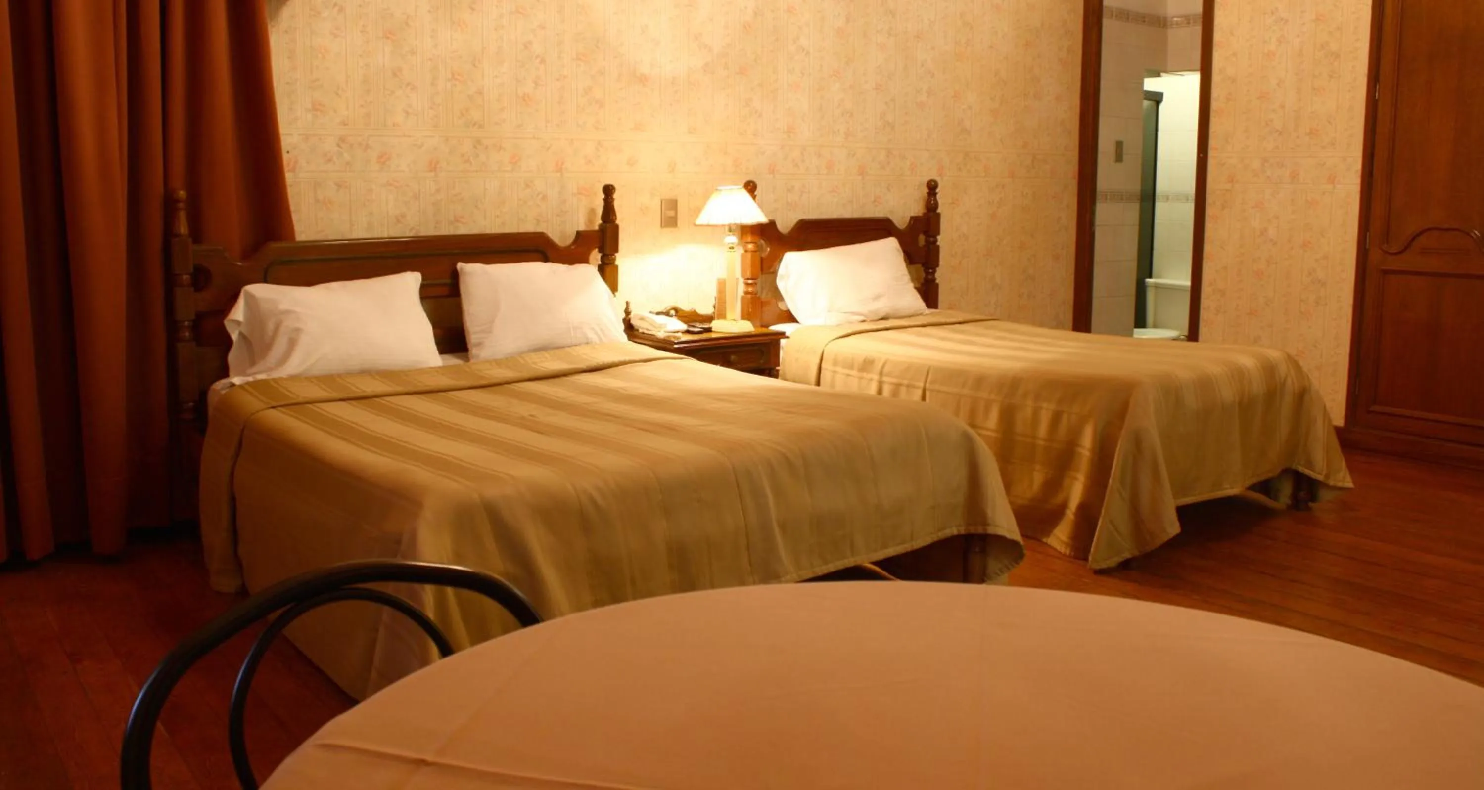 Bed in Capital Plaza Hotel