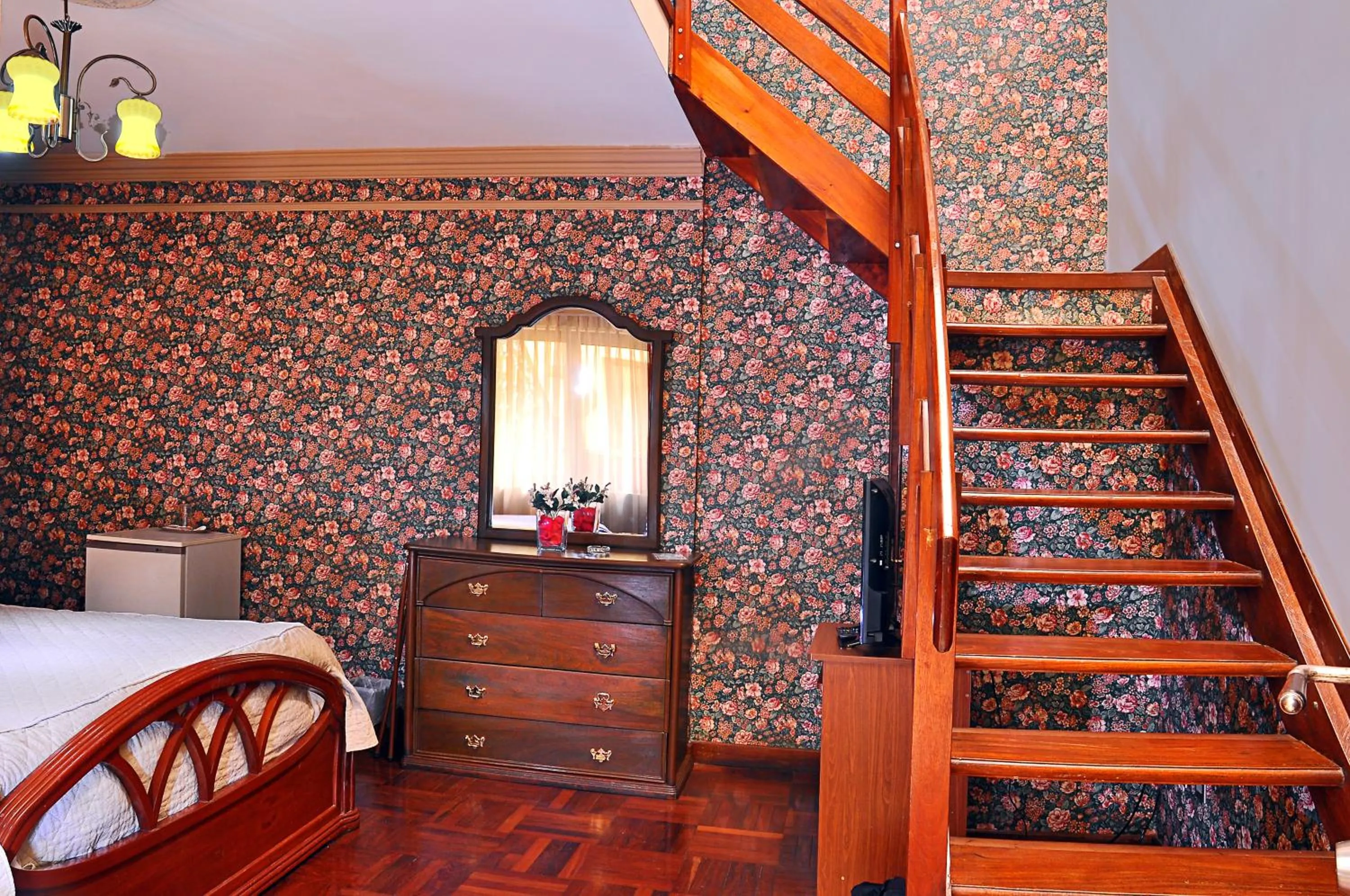 Bedroom in Capital Plaza Hotel