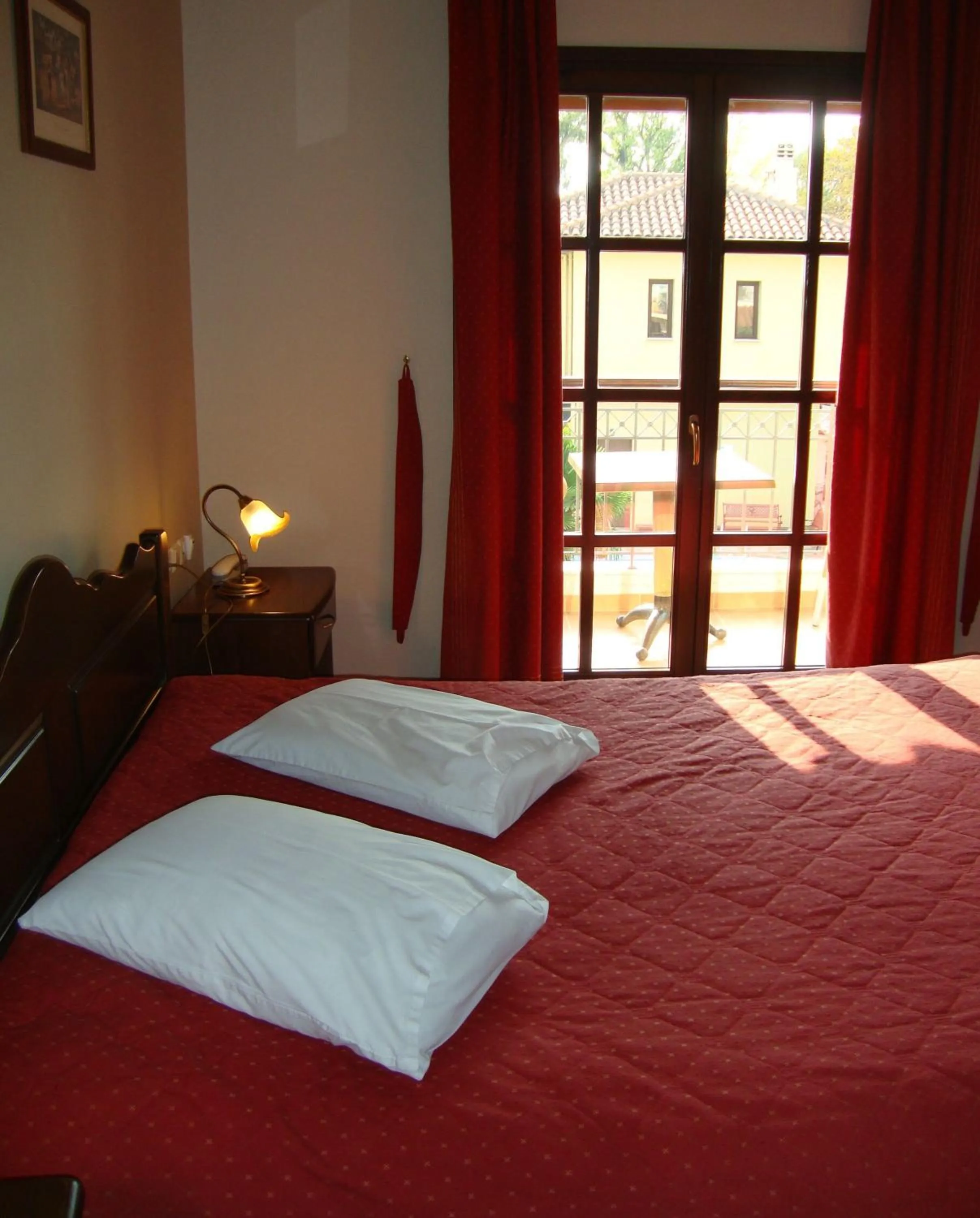 Bedroom in Enalion Hotel