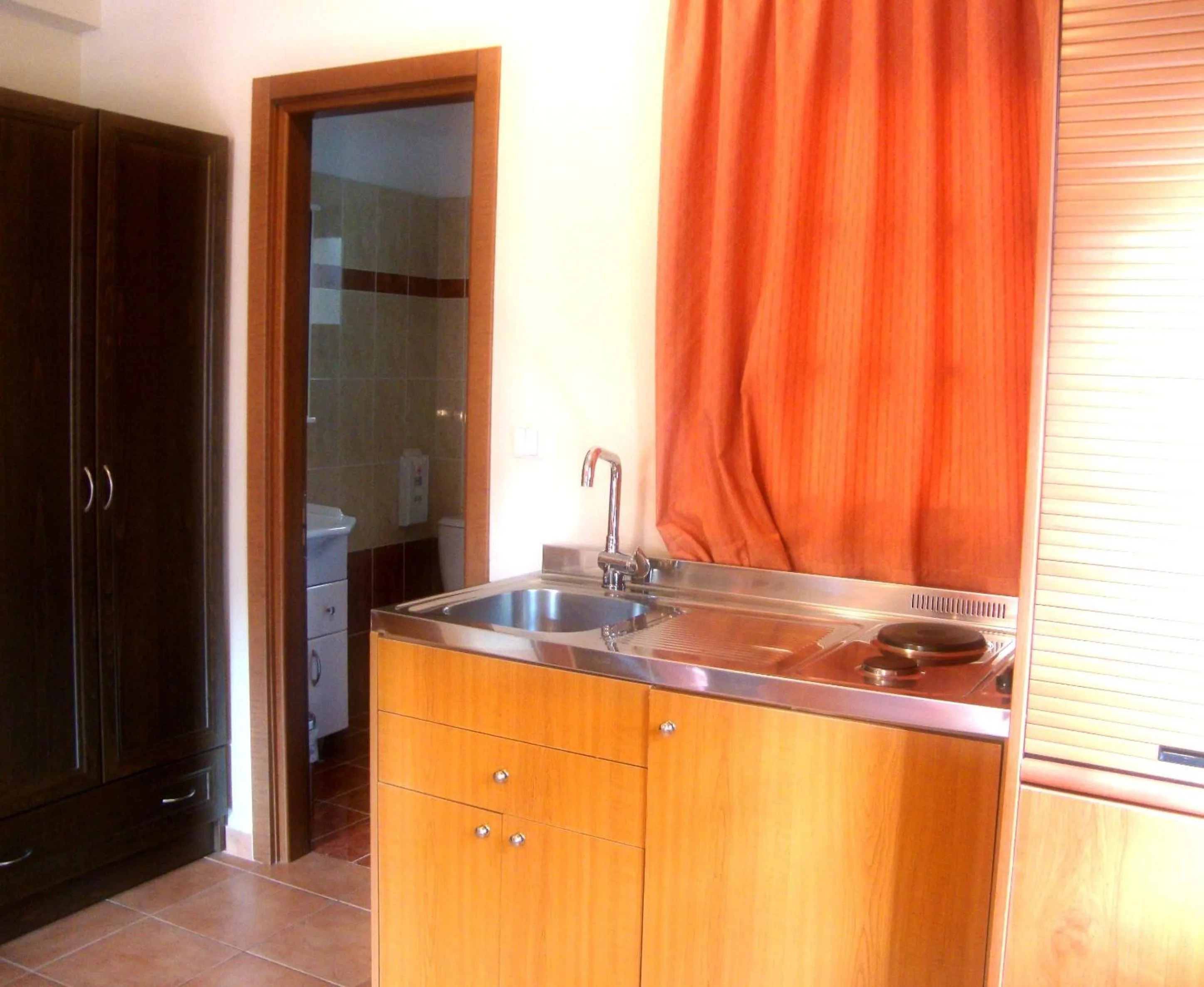 Kitchen or kitchenette in Enalion Hotel