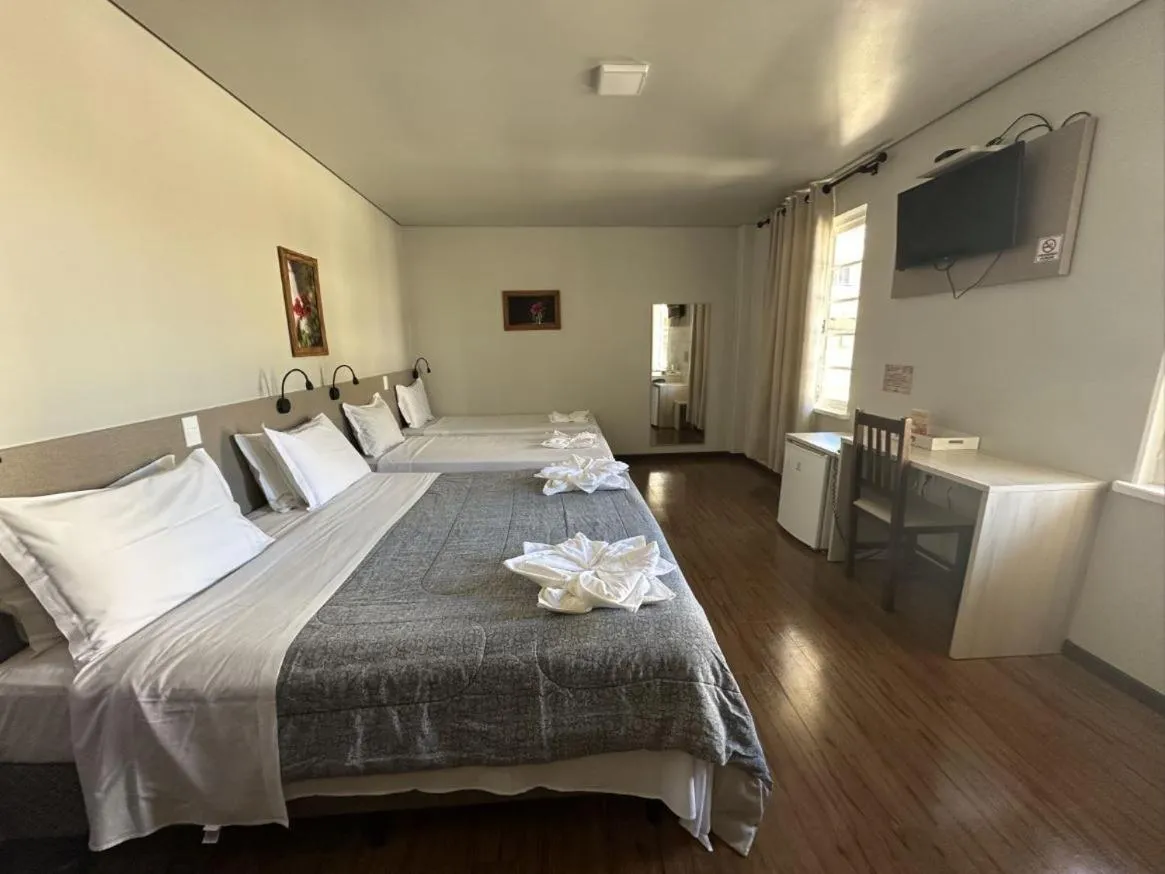 Bed in Pousada Casarão Schmidt