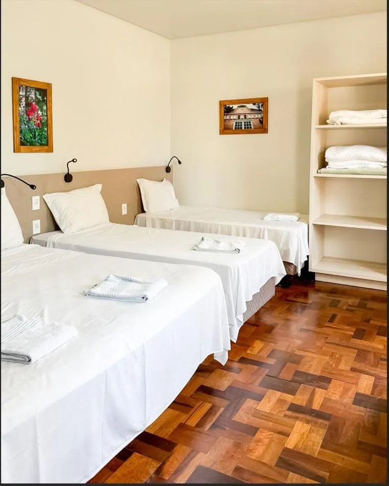 Bed in Pousada Casarão Schmidt