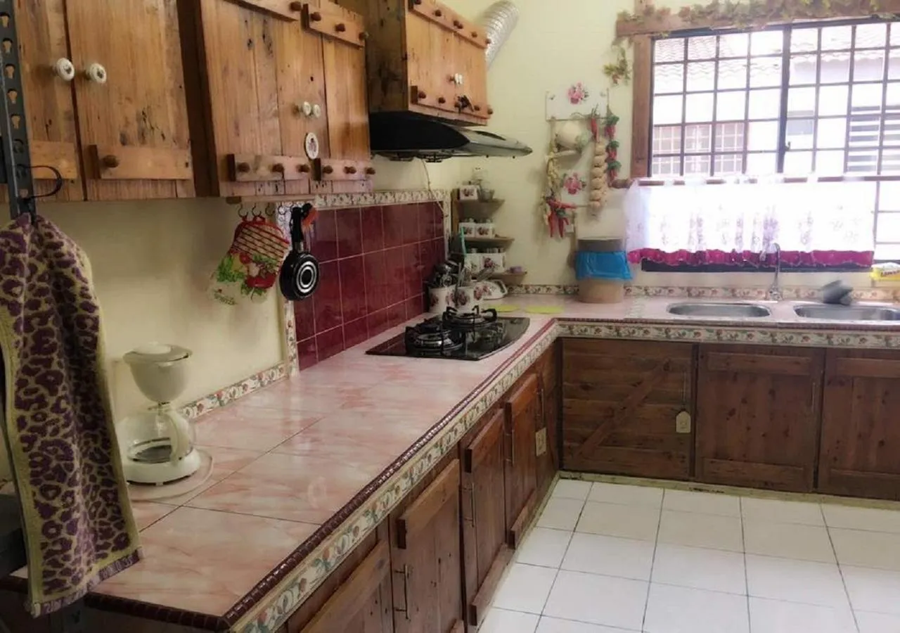 Kitchen or kitchenette in Homestay Pagar Buruk Ipoh