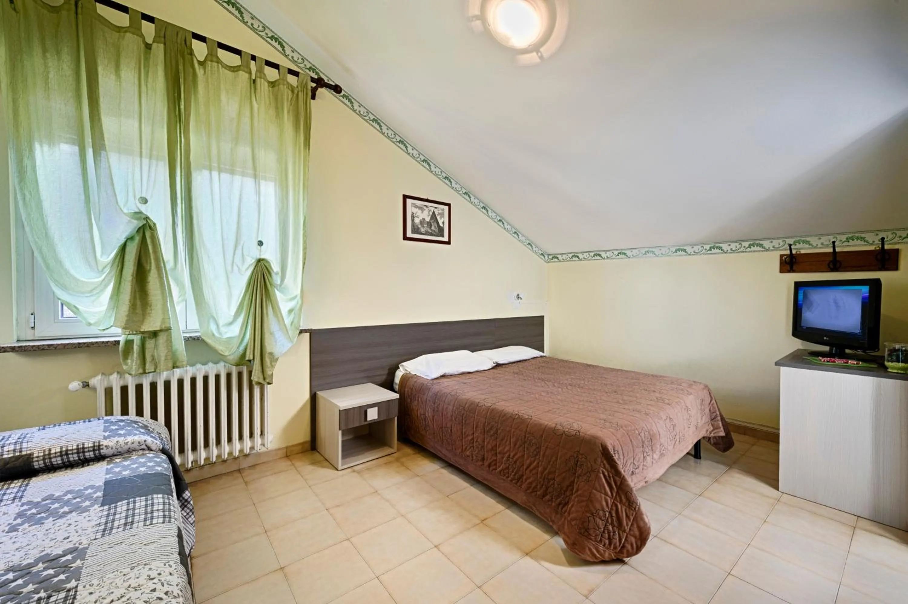 Bed in Albergo Mancuso del Voison