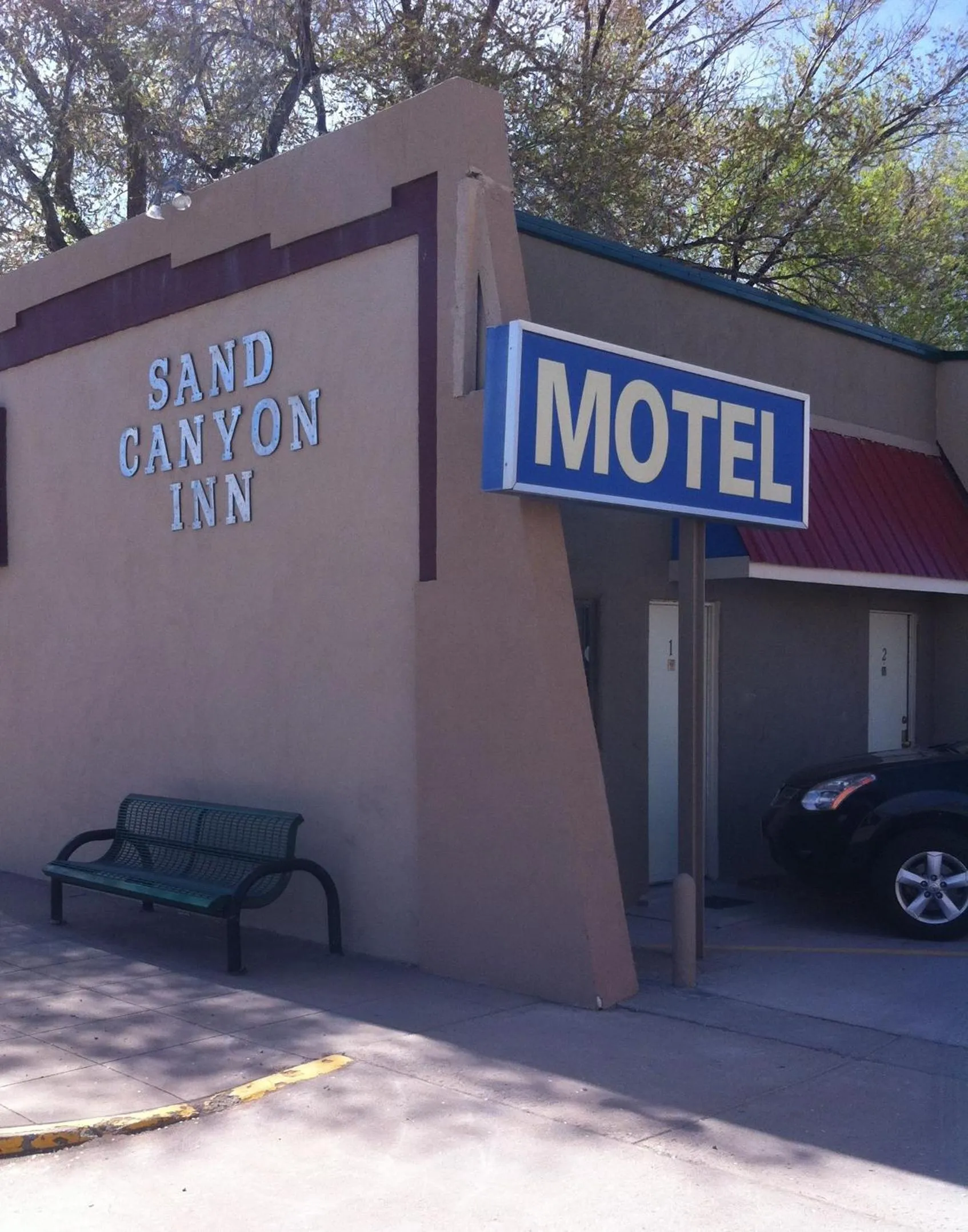 Property logo or sign in National 9 Inn Sand Canyon