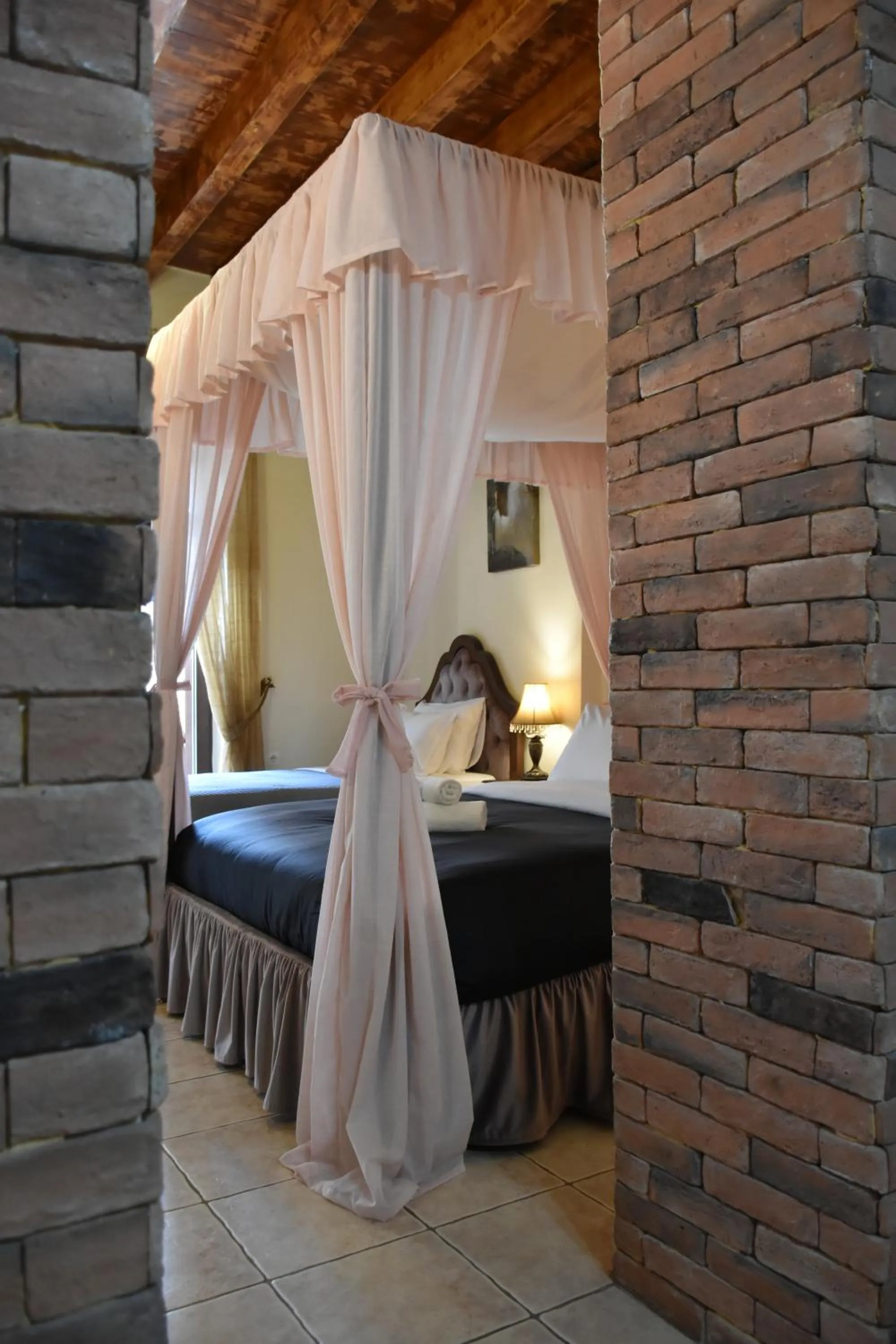 Bed in Odos Oneiron Boutique Hotel