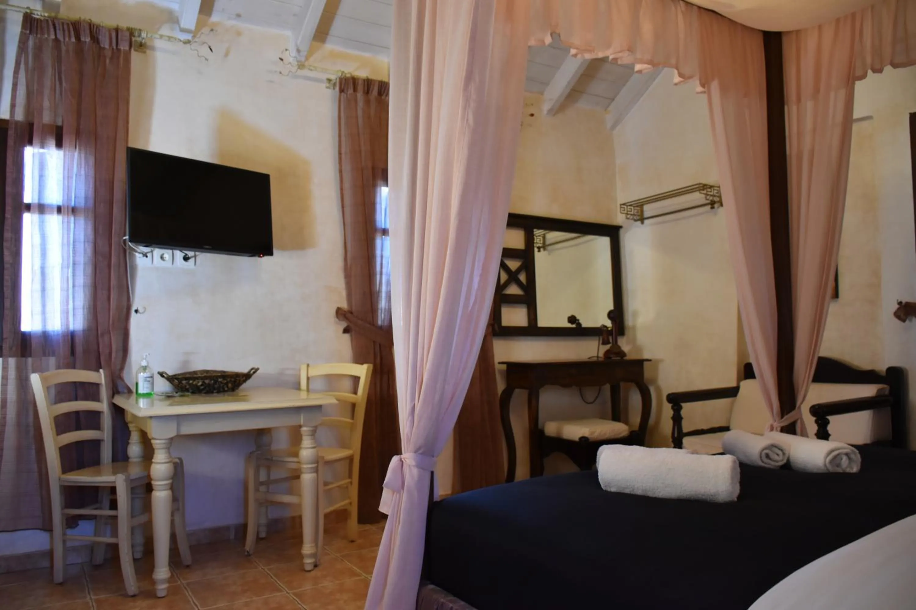 Bed in Odos Oneiron Boutique Hotel