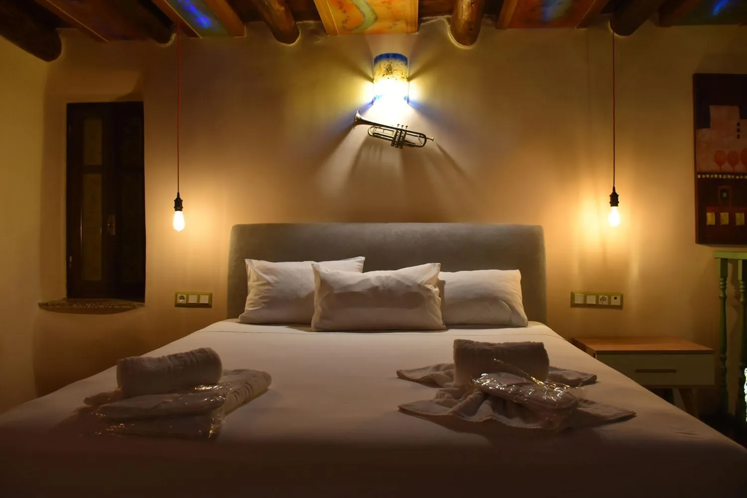 Bed in Odos Oneiron Boutique Hotel