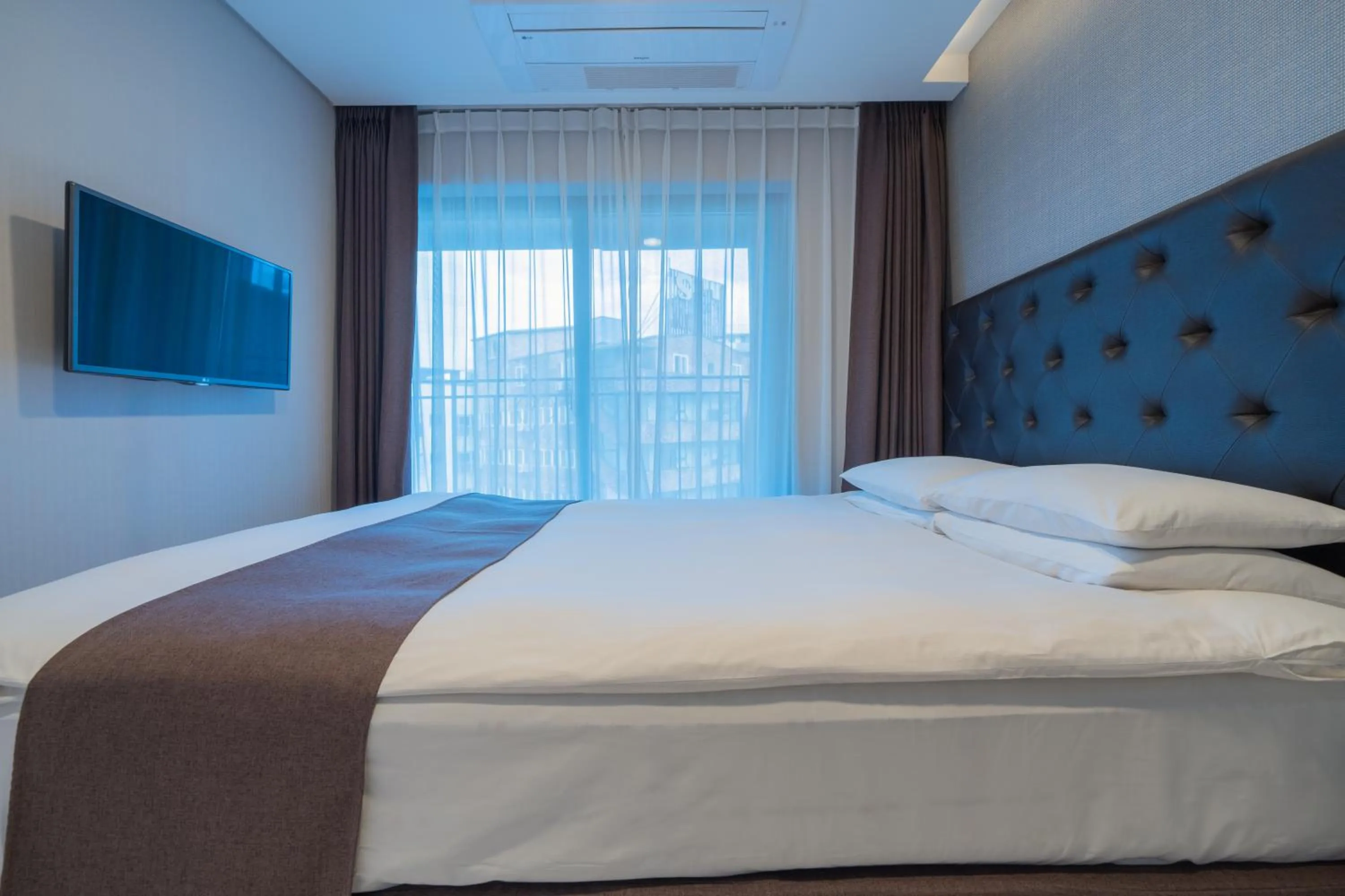 Bedroom, Bed in Hotel Stayon