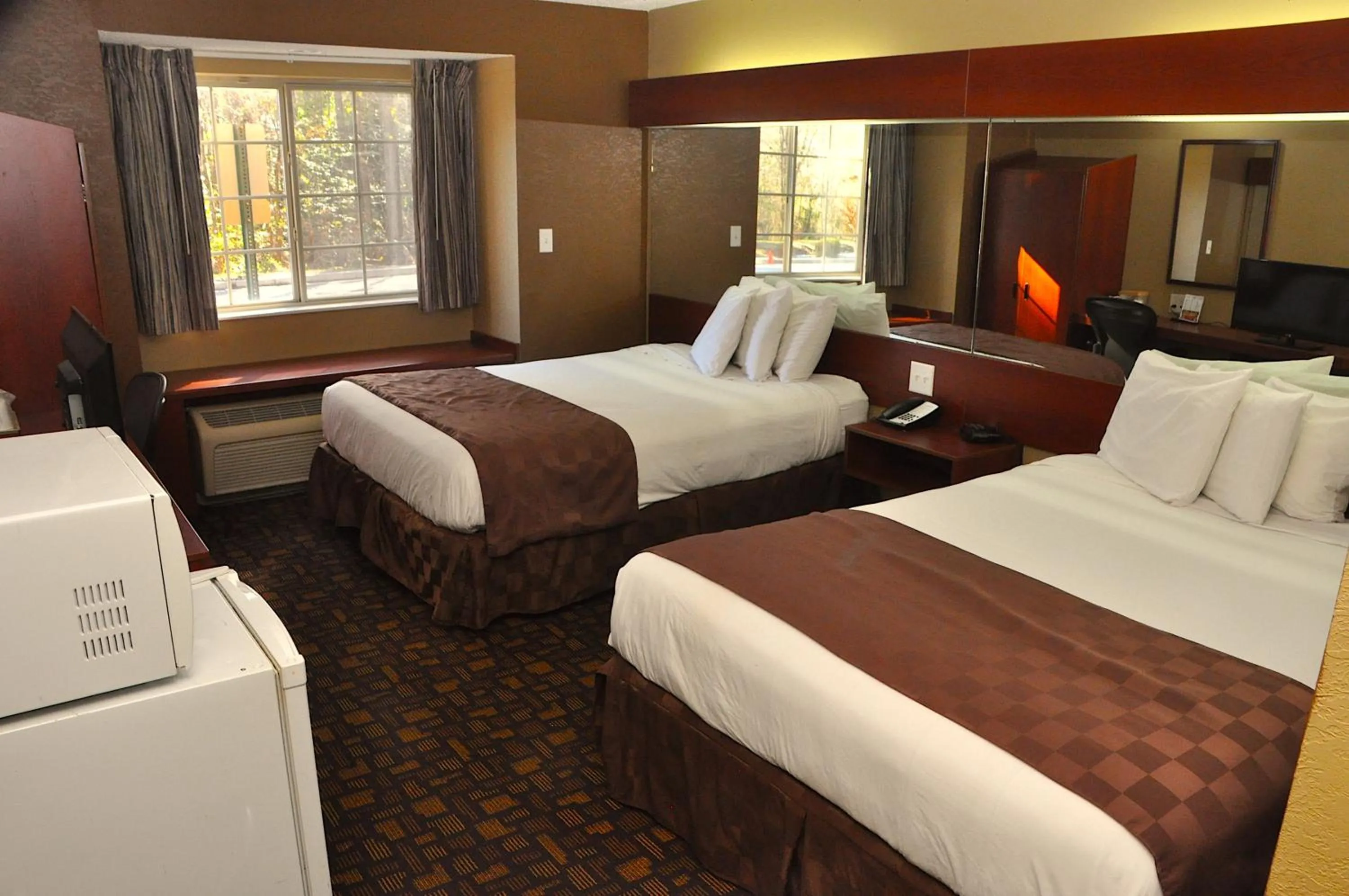 Bed in Microtel Inn & Suites by Wyndham Lithonia/Stone Mountain