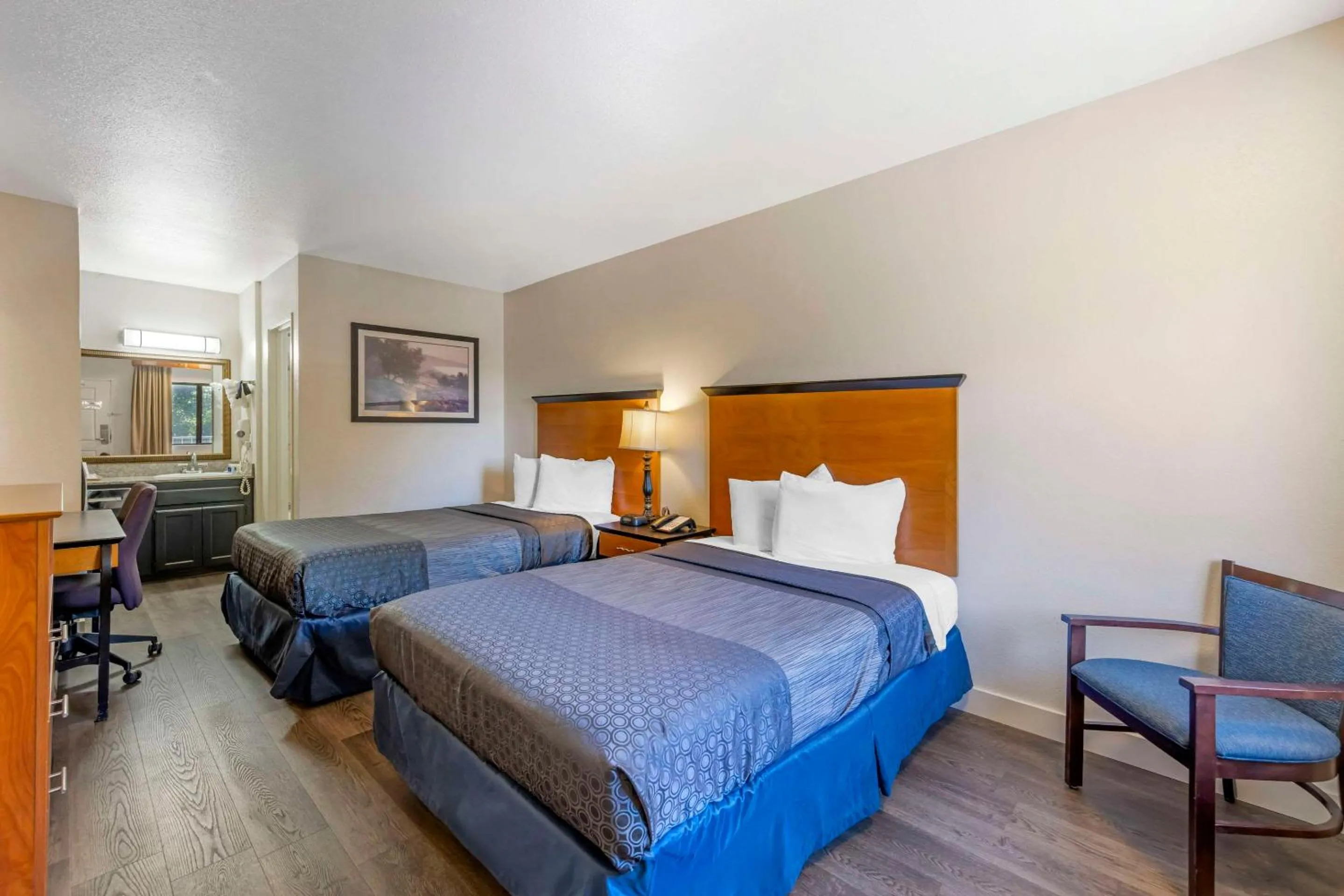 Bedroom, Bed in Rodeway Inn at Nevada State Capitol