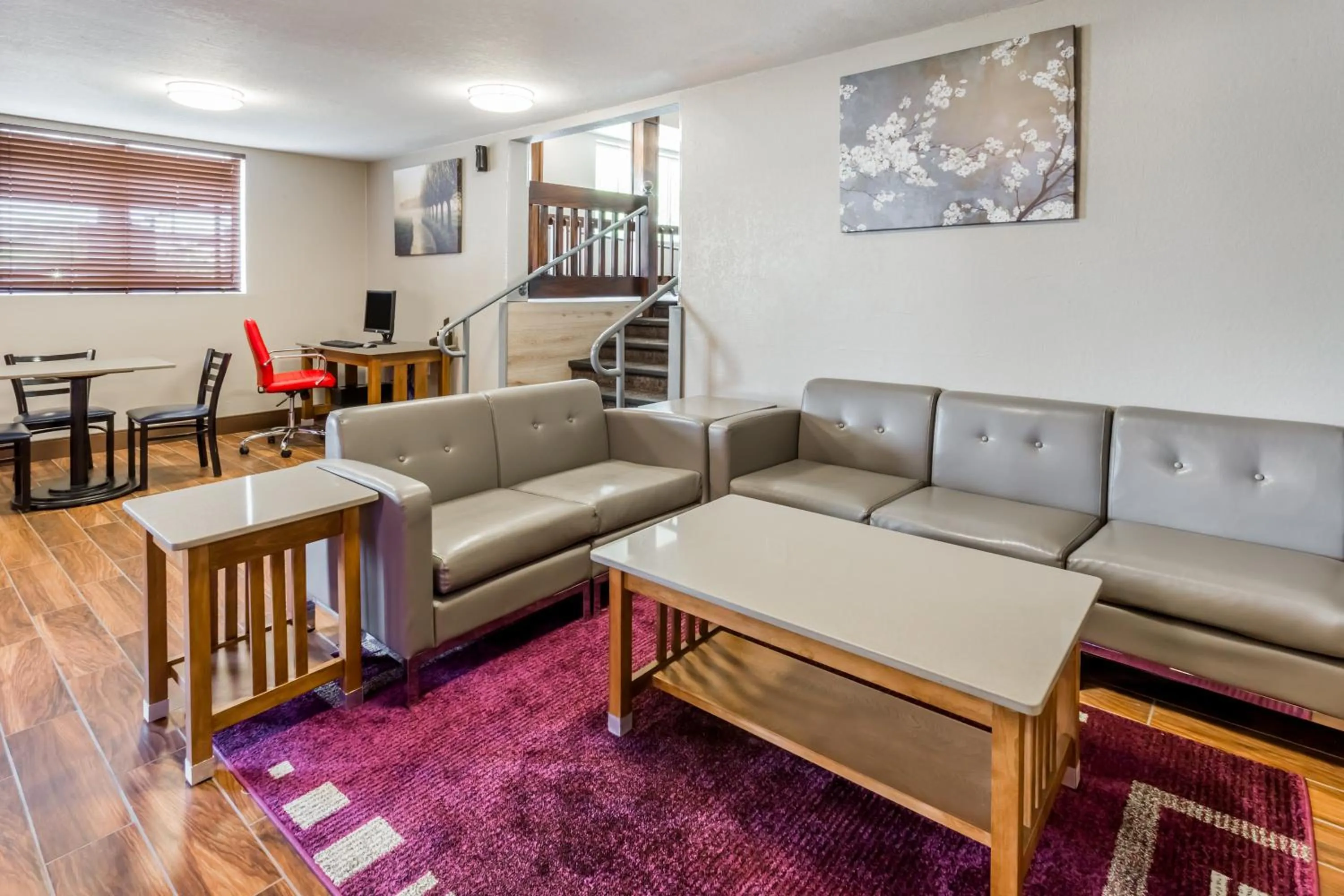 Seating area in Super 8 by Wyndham Iowa City/Coralville